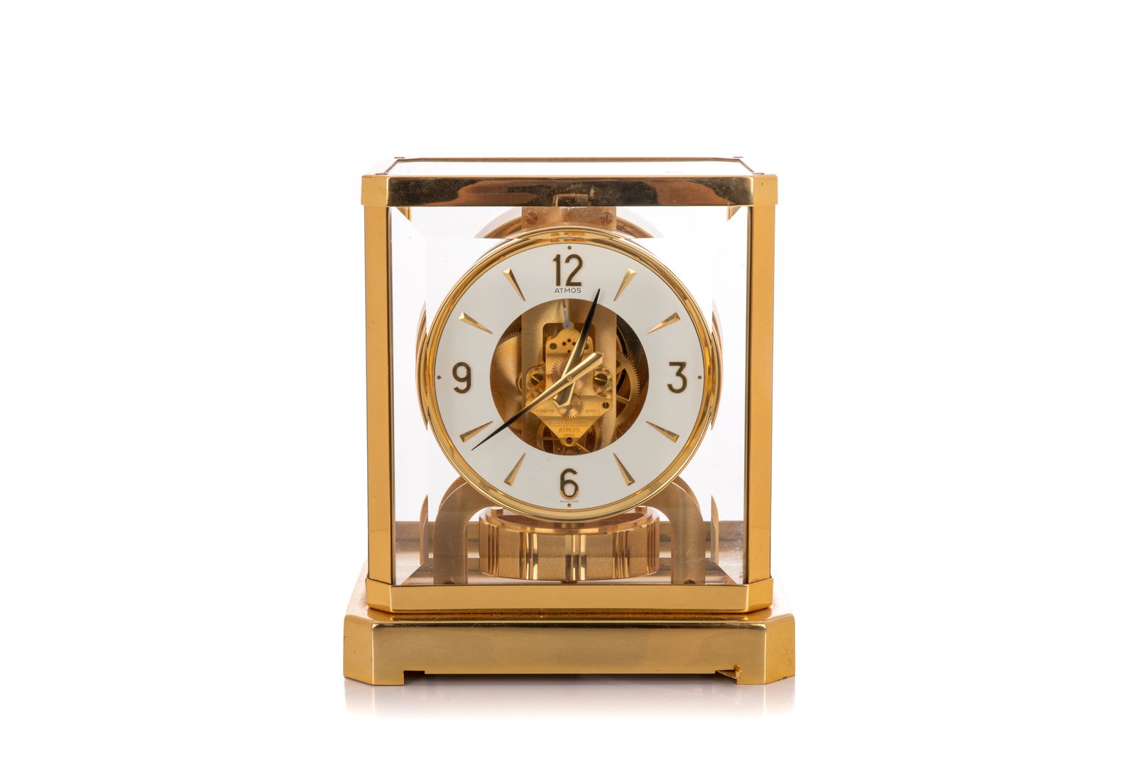 JAEGER-LECOULTRE ATMOS CLOCK: Brass case with Swiss movement Fifteen 15 Jewel case number 525152, 20th C. H. 9 1/4" x W. 7 1/2" x D. 5 5/8" (23.4cm x 18.5cm x 14cm)