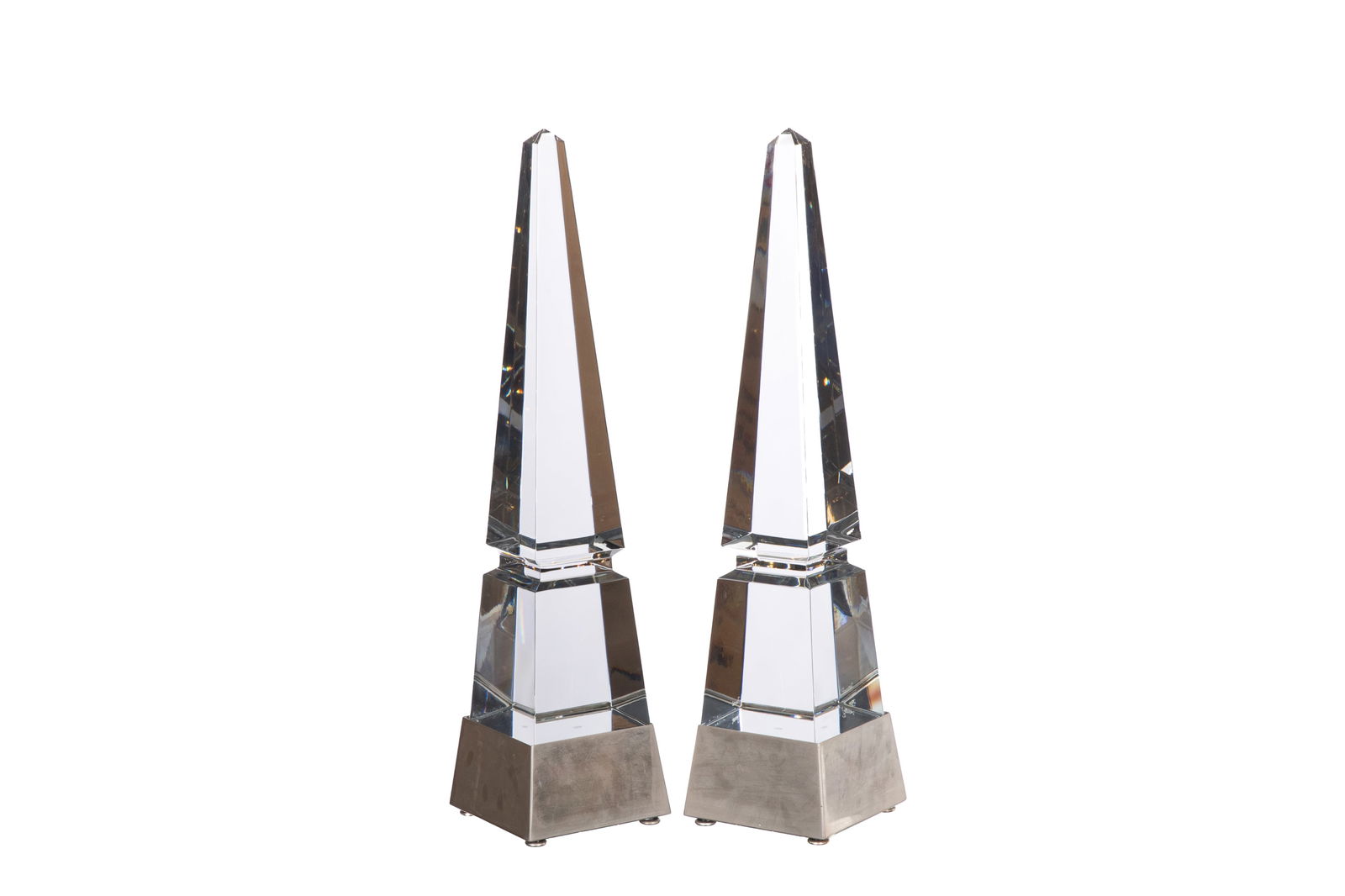 PAIR OF LARGE BACCARAT FRENCH GLASS OBELISKS: Mounted on brushed white metal lamp bases. Removable. Baccarat, 20th C. H overall 76cm (30in) H of glass obelisks 65cm (25 1/2in)