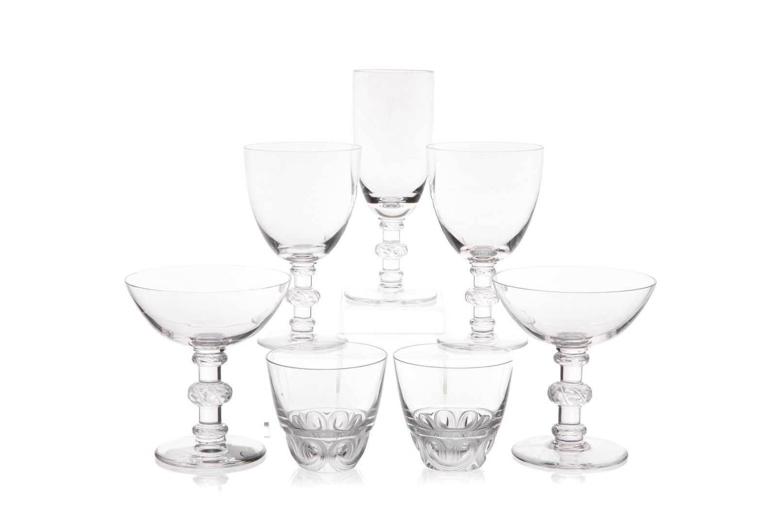 SEVENTEEN LALIQUE FRANCE GLASSES: Saint Hubert pattern. Consists of 3 Red Wine Glasses; 1 Champagne Flute; 5 White Wine Glasses; 6 Martini Glasses; and 2 Tumblers Champagne Flute H 15.4cm (6 3/8in)
