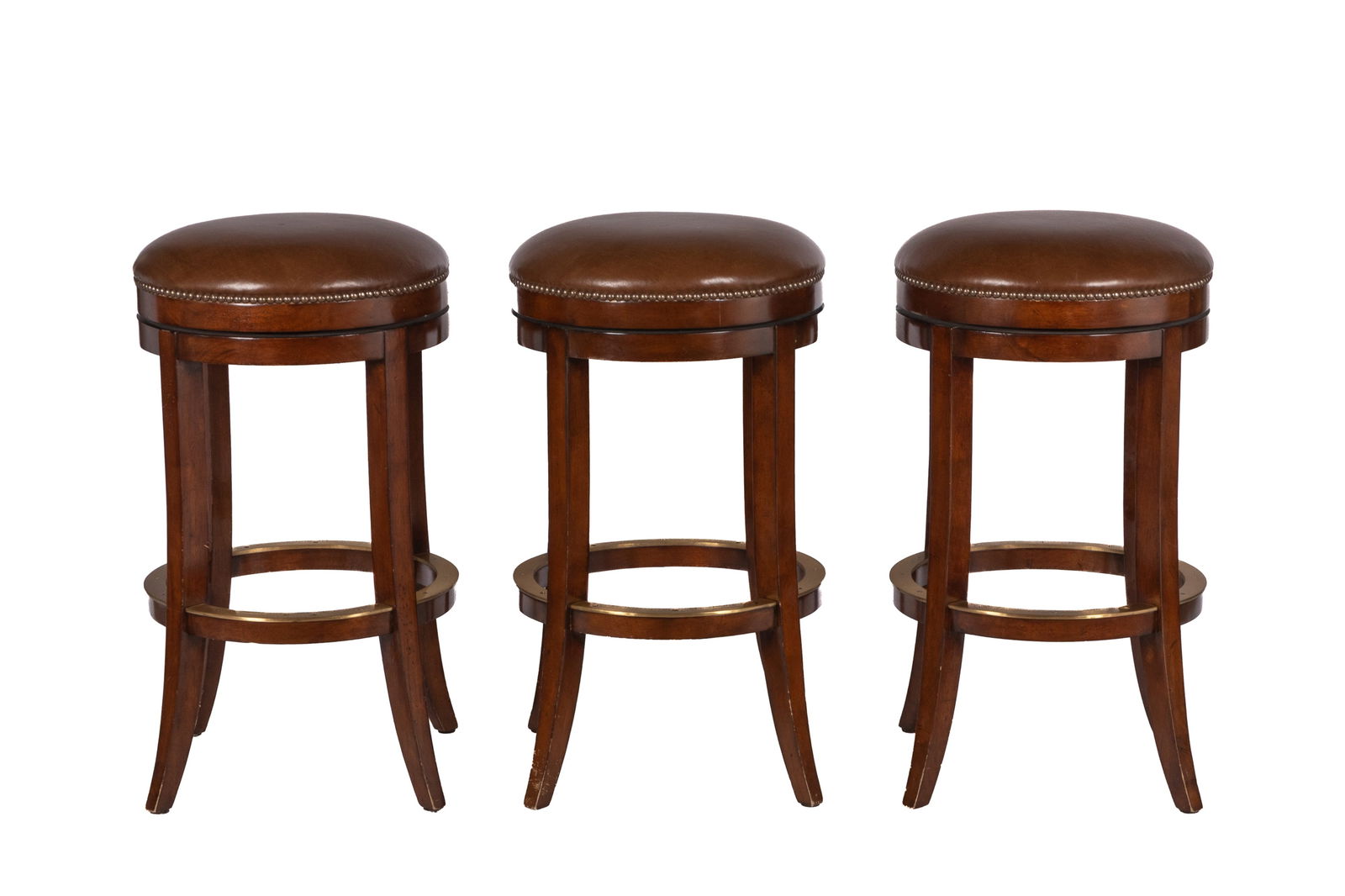 THREE WOODBRIDGE FURNITURE CO. STOOLS: Wood legs with brown leather seats. H. 30" x Dia. 17"
