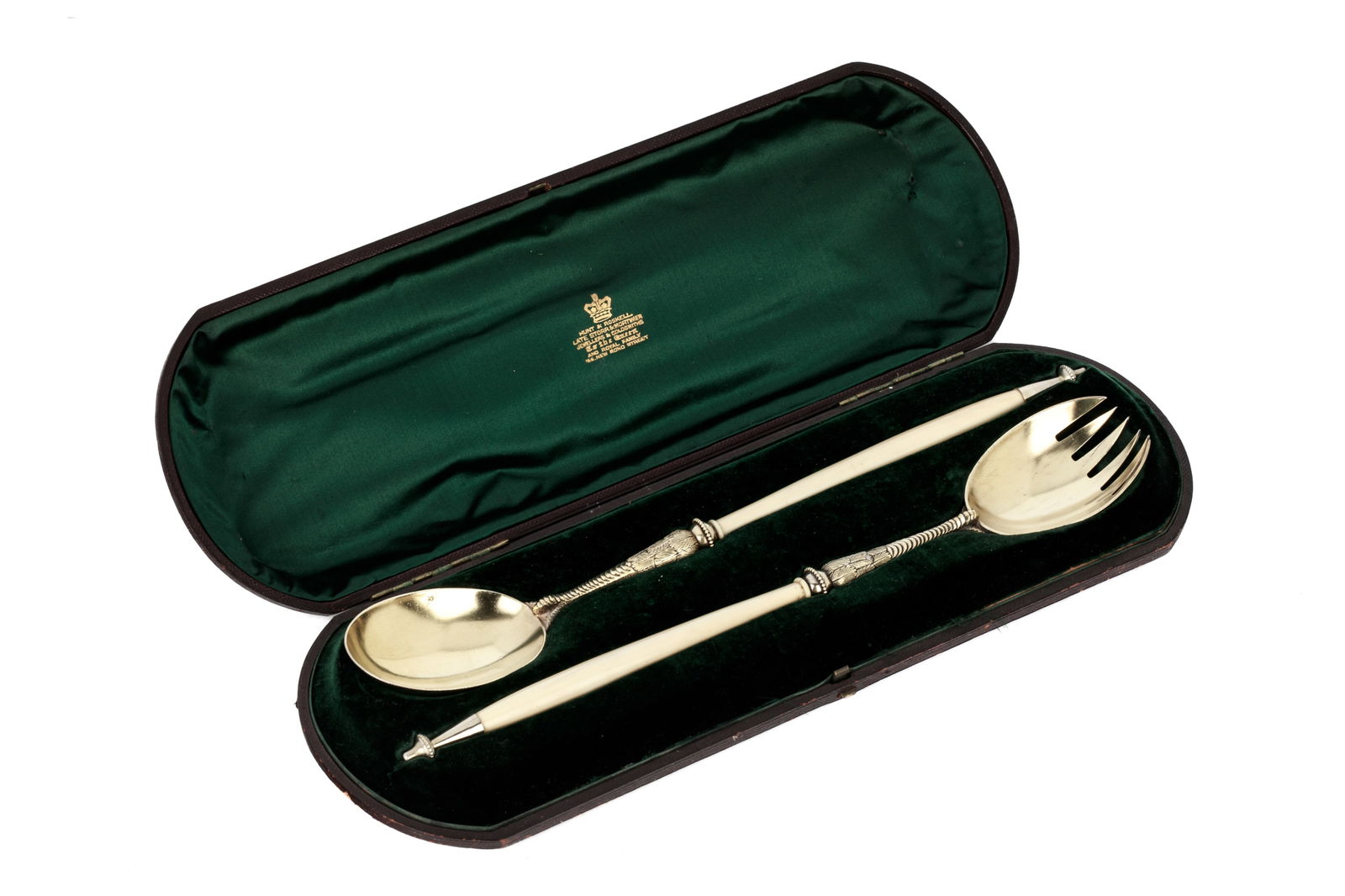 CASED VICTORIAN SILVER SERVERS: A fine pair of English Victorian novelty silver gilt servers. London 1871 by George Adams, retailed by court goldsmiths Hunt & Roskell. The back of the silver gilt bowls are decorated with realistical