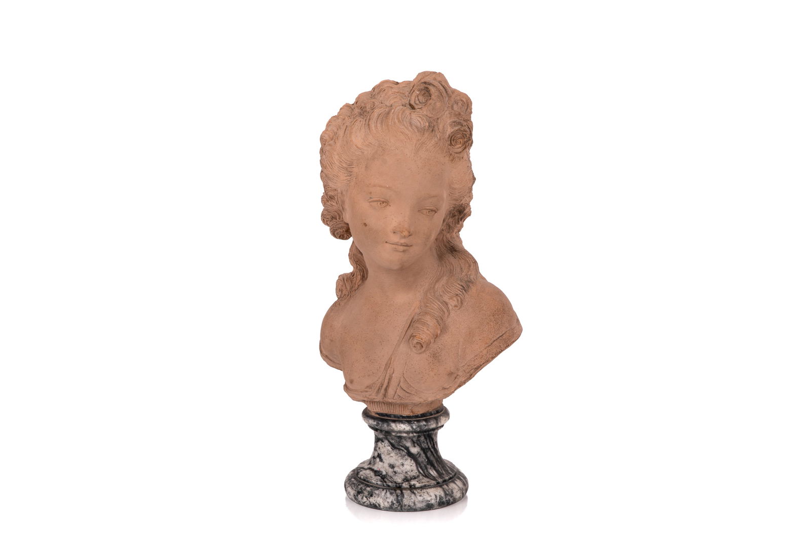 ITALIAN TERRACOTTA BUST OF A YOUNG WOMAN: On verigated black and white marble column base, early to mid 20th C. H. 19 1/2" (49.5cm)