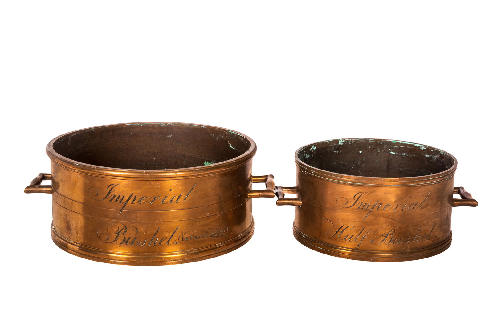 TWO 19th C ENGLISH BRONZE MEASURES: County of Hereford, 1825 Imperial Bushel and Imperial half Bushel, Dia. of Bushel: 50.5 cm (20") to Handles. 60cm (23 3/4") Dia. of the half Bushel 38.5cm ( 15 1/4") to handles 49cm (19 1/4")
