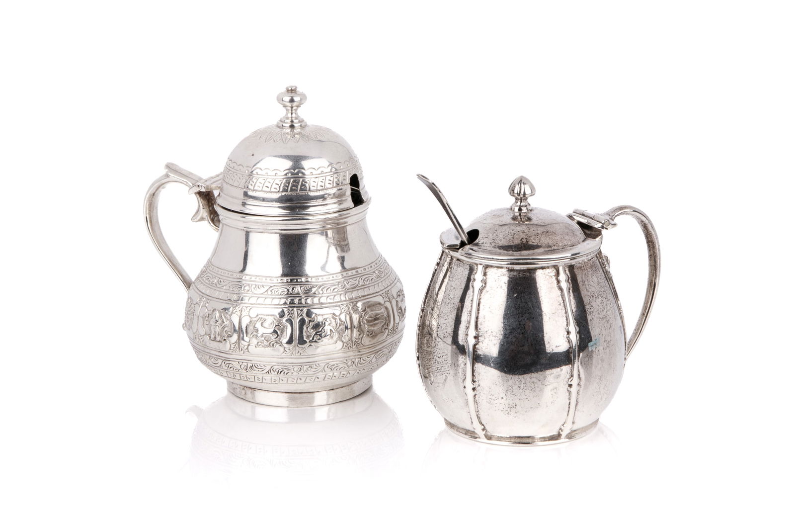 TWO ENGLISH SILVER MUSTARD POTS 217 g.: Brook & Son, Sheffield, 1906. and George Fox, London, 1864. 217g weight for both H. of taller 9.5 cm 3 3/4 in.