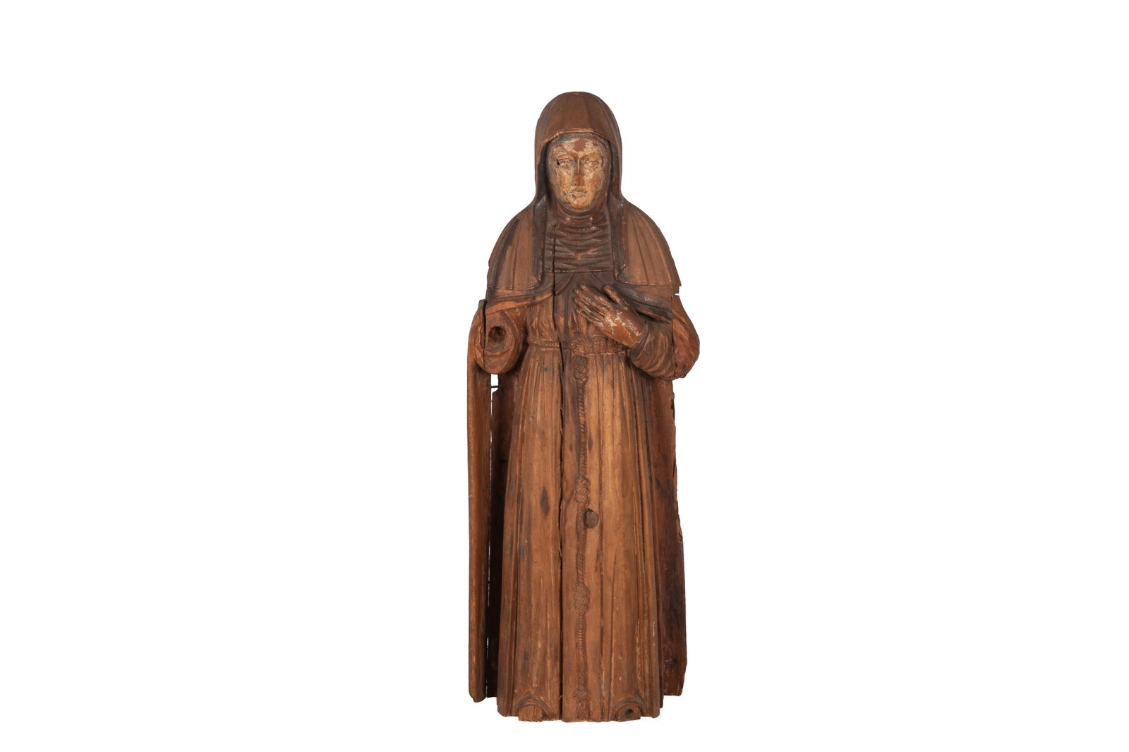 ANTIQUE CARVED WOOD SAINT: Of a standing Madonna in robe with rosary. Remnants of pigment on her face, probably European 17th / 18th C. H. 35 3/4" x W. 13" x D. 6 1/4" Comes with later stand, adding 8" in height.