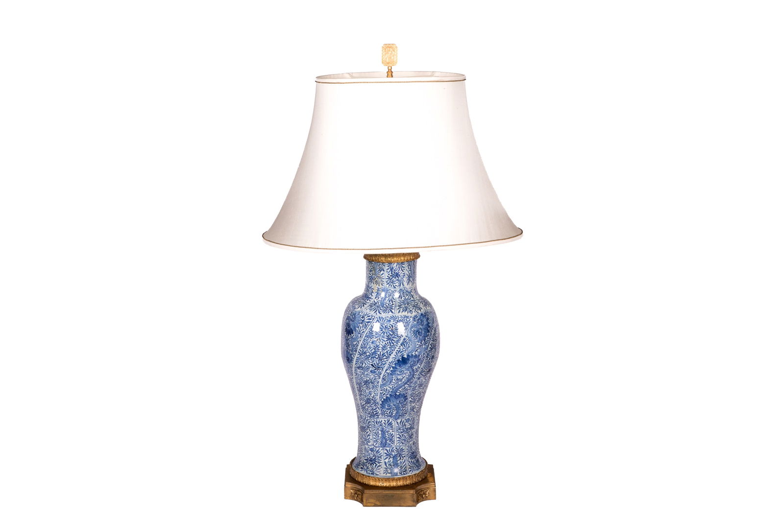 ANTIQUE CHINESE PORCELAIN VASE AS LAMP: Overall blue and white floral pattern vase probably Kangxi period with French bronze mounts. H. of the vase: 24", Overall H. 40"