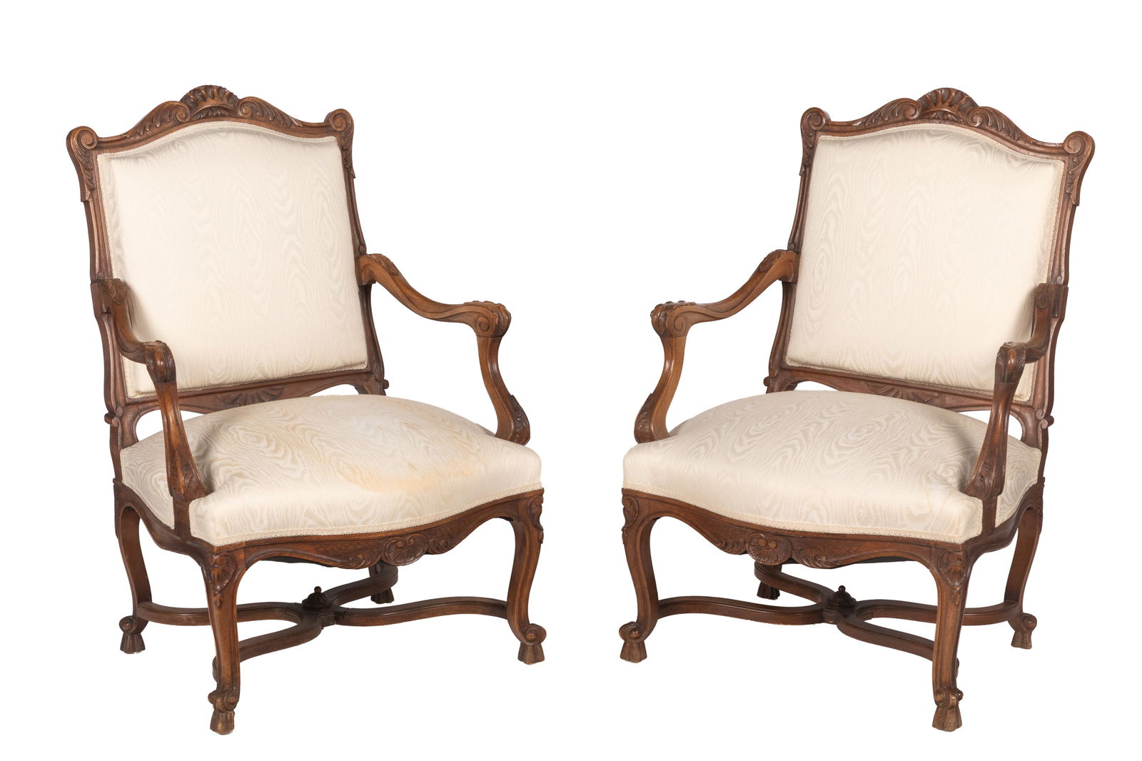 PAIR OF FRENCH PROVINCIAL ARMCHAIRS: Carved walnut frames with hoof feet and x-design stretcher, modern silk brocade upholstery. H 40" x W 28" x D 22"