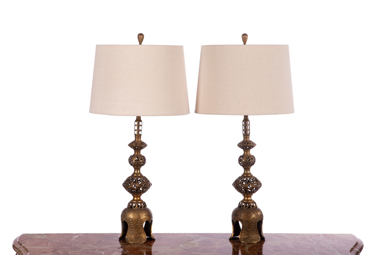 PAIR OF JAPANESE HOLLYWOOD REGENCY BRASS LAMPS: Including two pierced candlestick lamps. H. 79 cm each