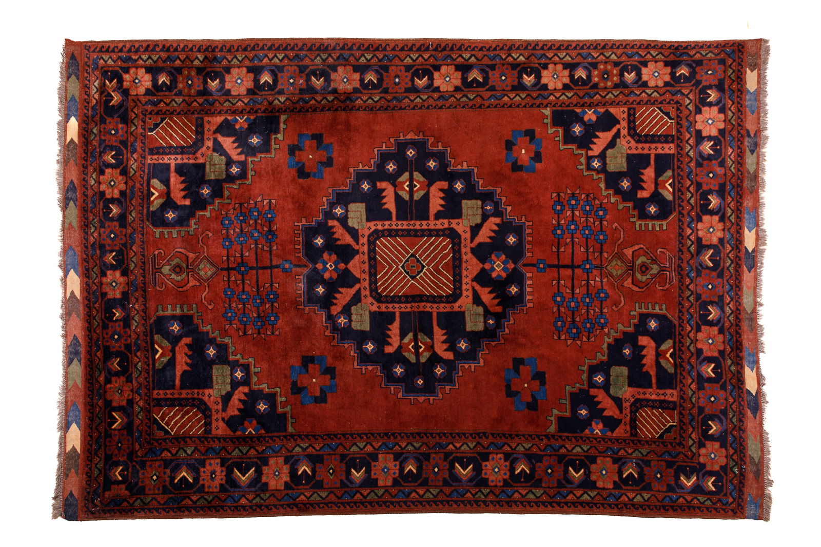 RED GROUND TRIBAL RUG: L 10' x W 6' 10"