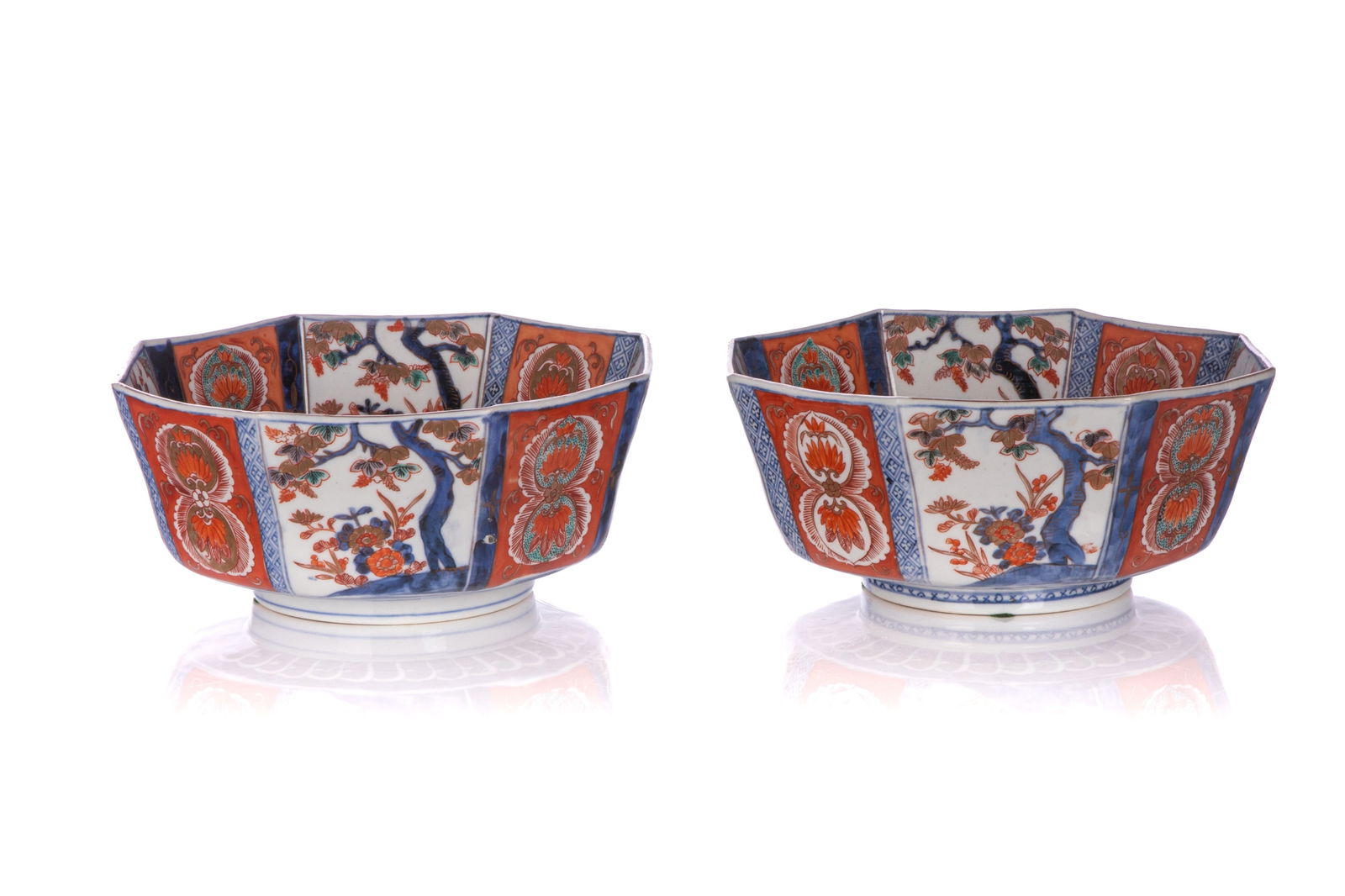 PAIR OF OCTAGONAL JAPANESE IMARI BOWLS: Pair of Japanese Imari bowls in octagonal form and hand-painted with various floral bouquets and foliate motifs along the interior and exterior. Japanese, 19th C. W 9 3/4" (25cm) x H 4" (10cm)