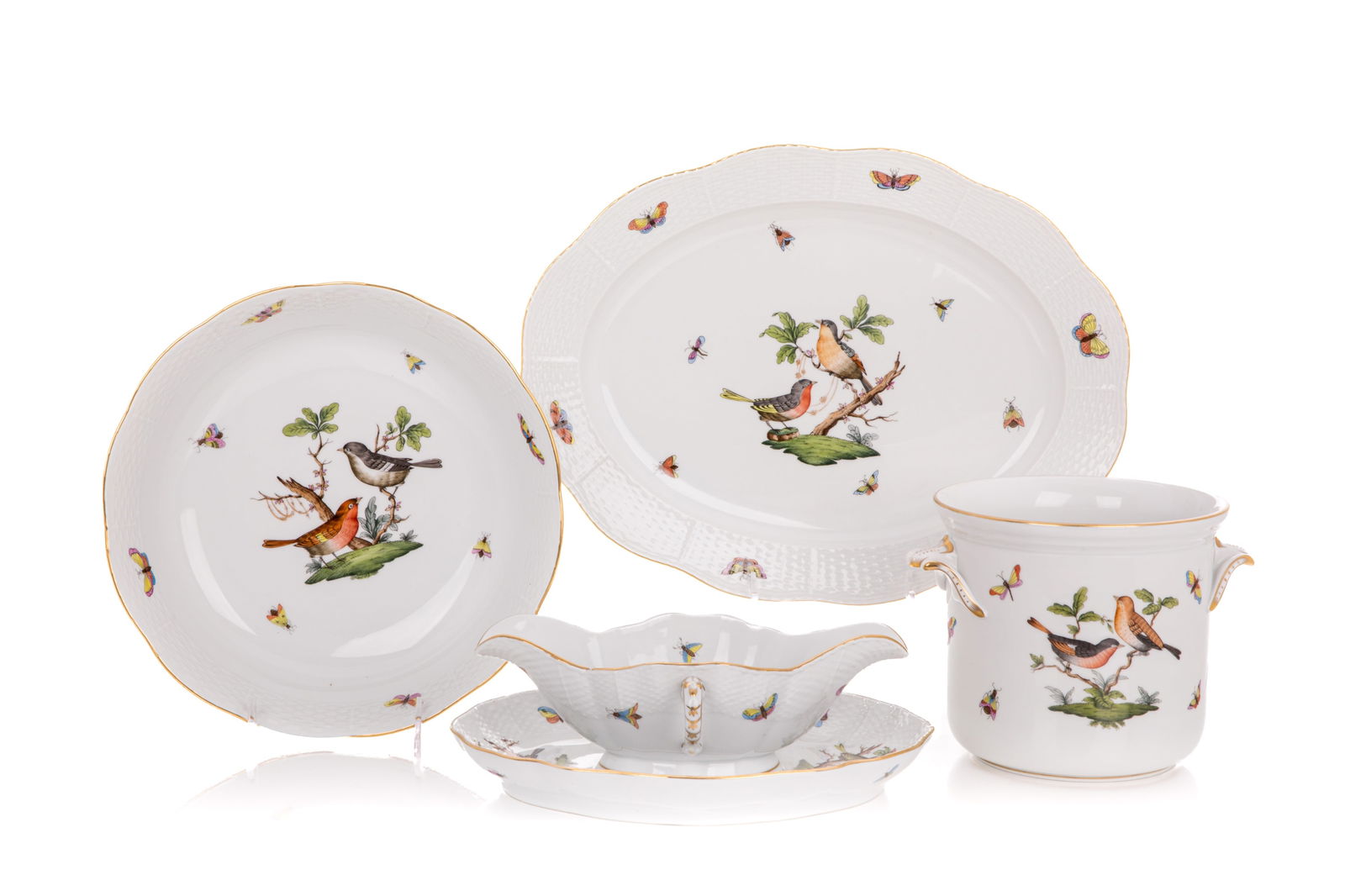 FOUR HEREND ROTHSCHILD BIRD PORCELAIN SERVING PCS: Saucer boat with attached stand, platter, round serving bowl and wine cooler. L of platter 36.5cm (14 1/4in)