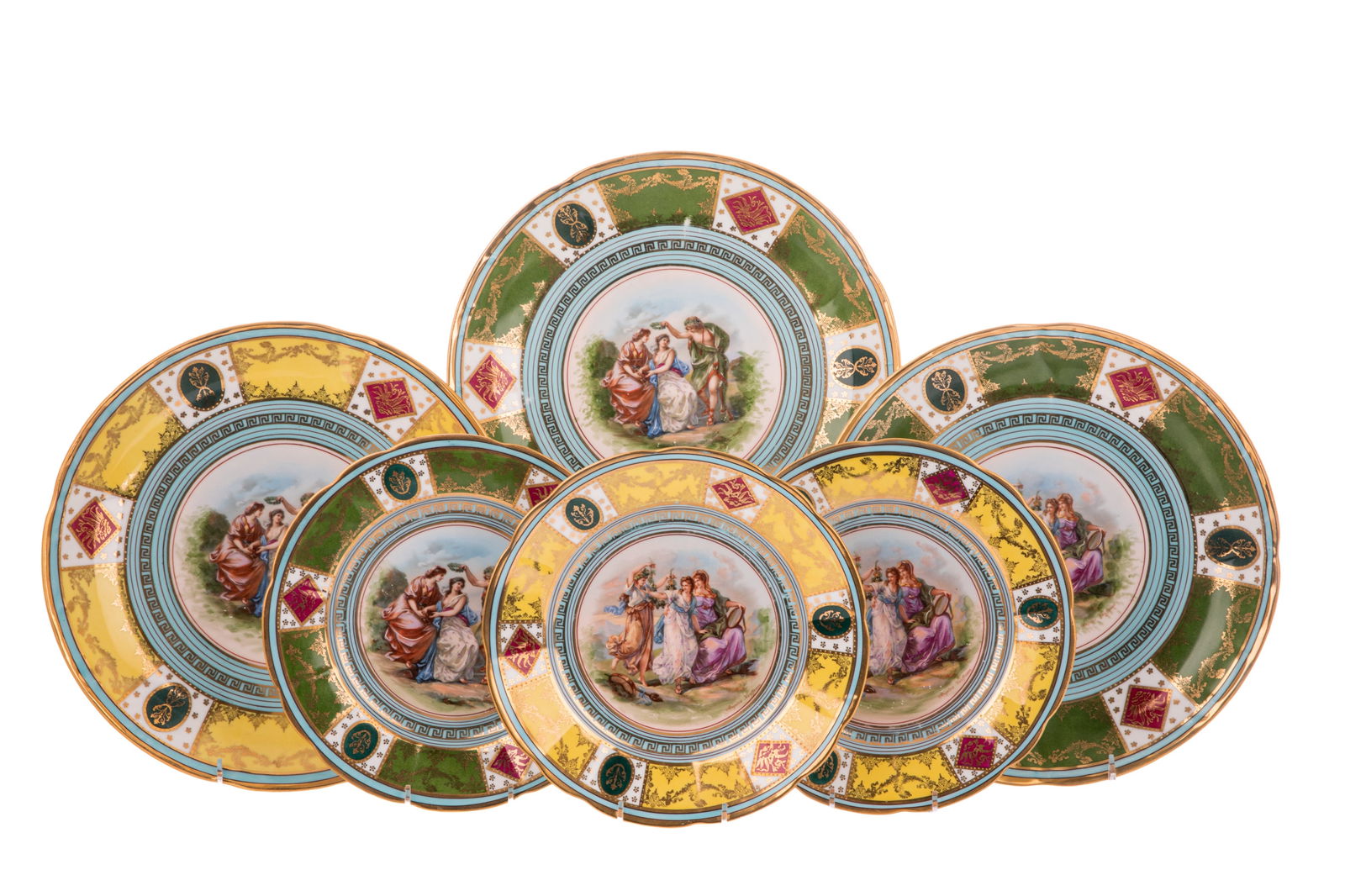 EIGHTEEN VIENNA STYLE PORCELAIN PLATES: Three large chargers (two green, one yellow), seven green and eight yellow borders. All with neoclassical transfer printed scenes, early 20th C with N and Crown Mark. Dia of large 31cm (12 1/4in) Dia