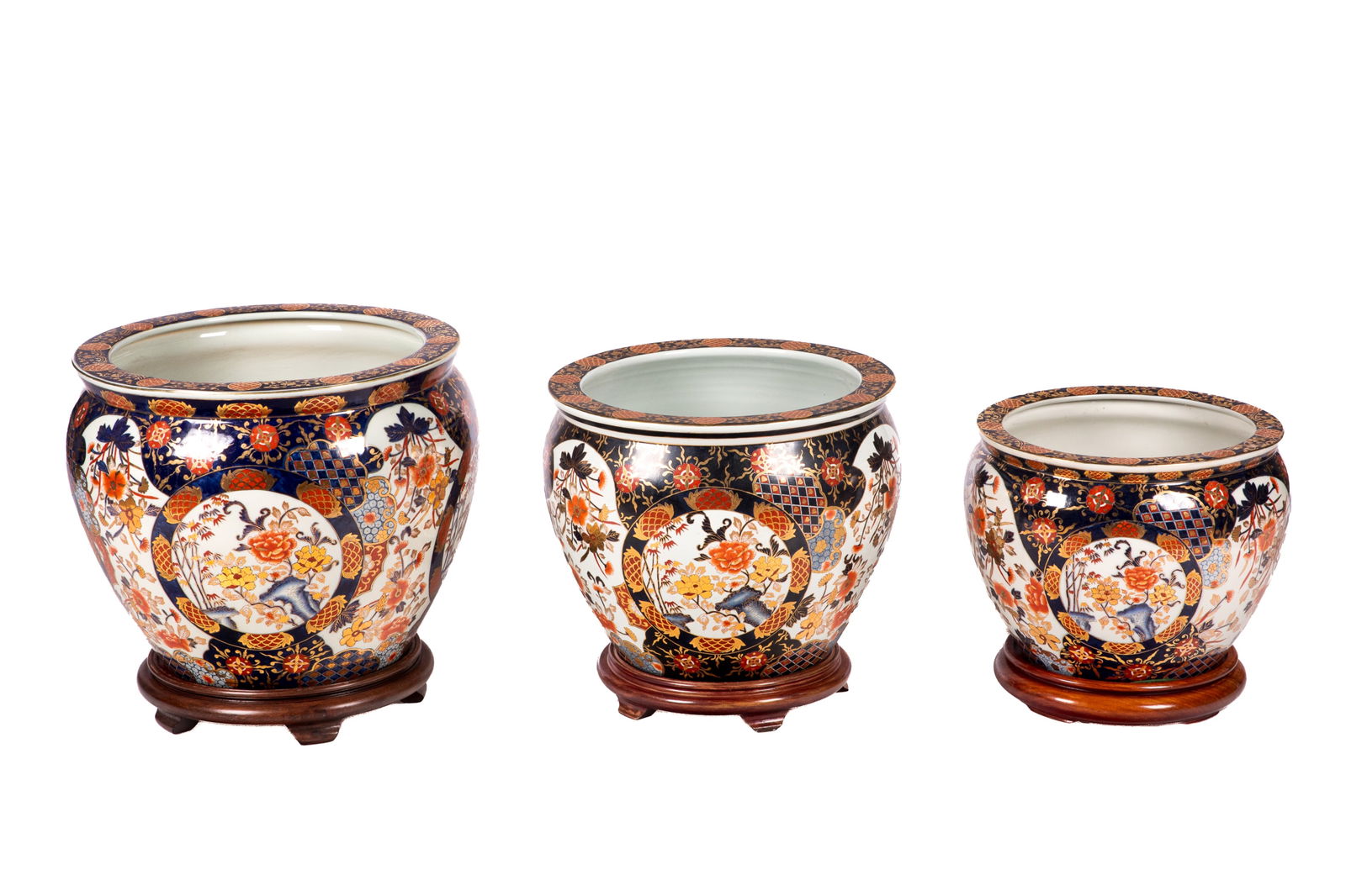 THREE GRADUATED DECORATIVE PORCELAIN JARDINERES: Imari style decoration. Largest H. 15in x Dia. 18in Smallest H. 11 1/4in x Dia. 14 1/8in