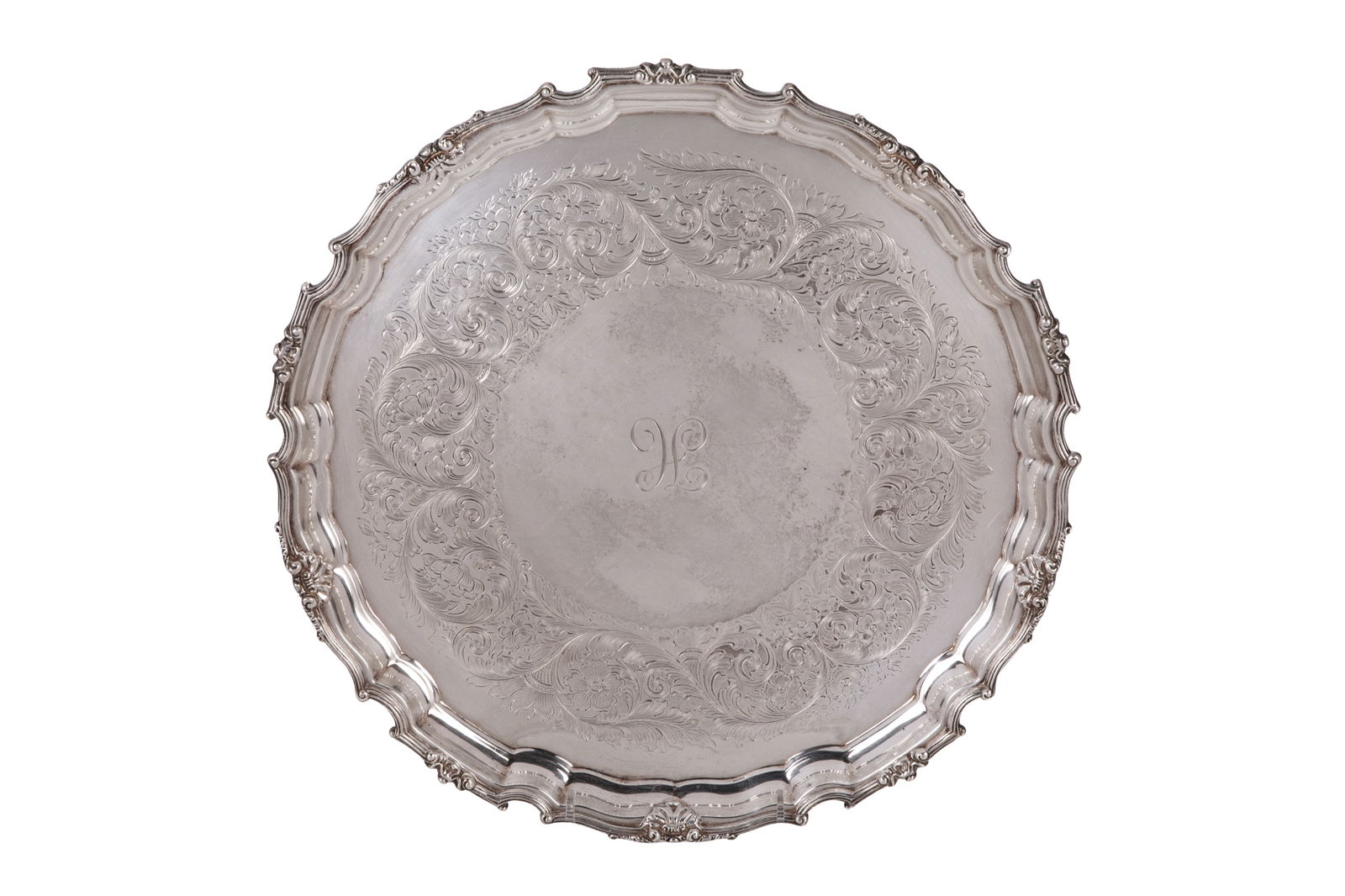 BIRKS CANADIAN SILVER SALVER 1293g.: With engraved foliate border and shaped rim, initialed H, inscription on back. 1,293g weight W. 35.5 cm 14 in.