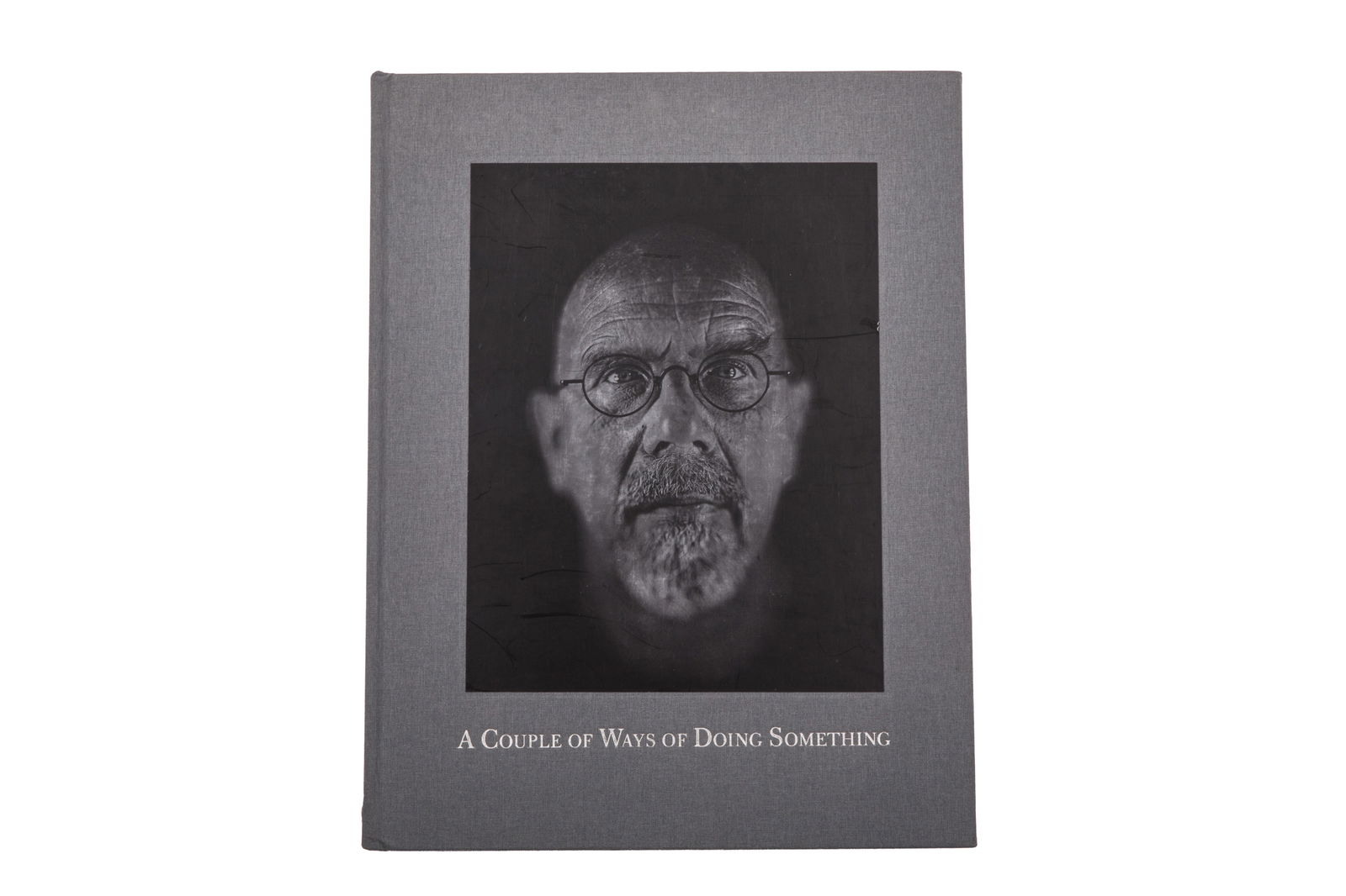 CHUCK CLOSE (American, 1940-2021): "Self Portrait 3" (2002) Print Ed. 18 / 30 Signed, numbered and dated at bottom Sheet size 29 3/4" x 22 1/2" Comes with a first edition copy of "A Couple of Ways of Doing Something" (New York: Apertur