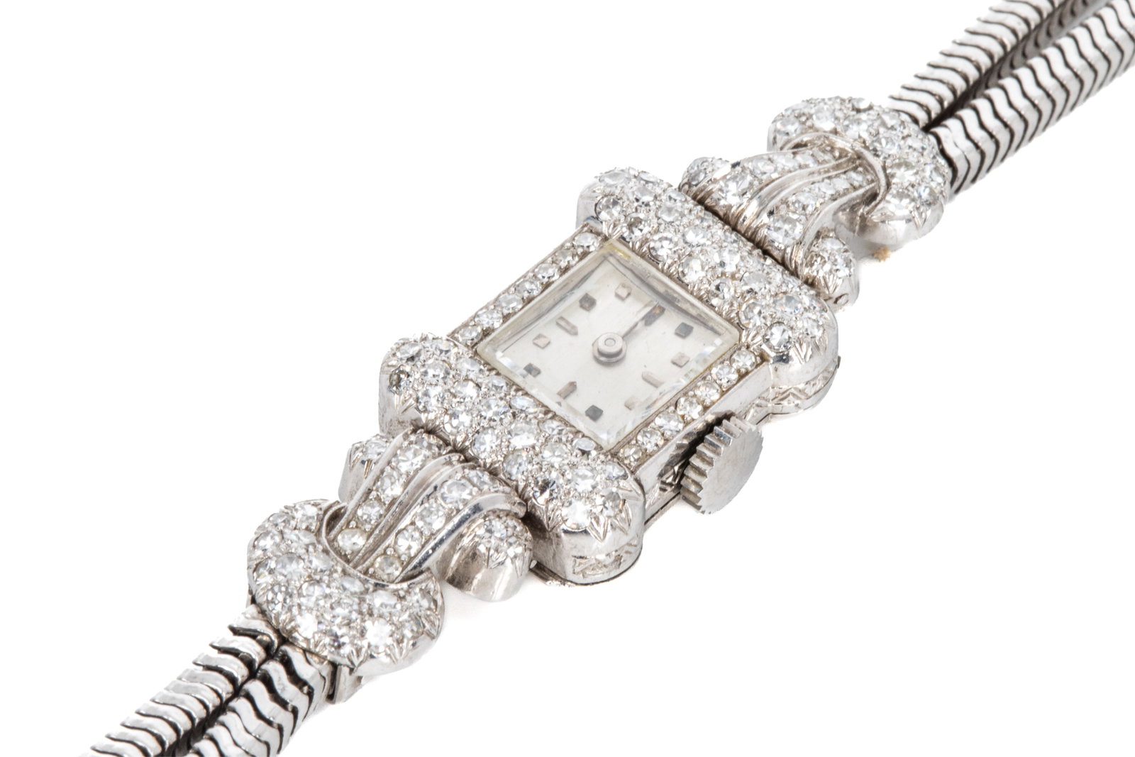 PLAT & 1.70cttw DIAMOND SWISS COCKTAIL WATCH 43.6g: 1940's platinum 950 cocktail watch, Swiss made movement, case, and bracelet, measuring 7 - 6.5 inches wearable length, case measuring 45.6mm long (hinged diamond ends included) by 15.4mm wide by6.7mm 