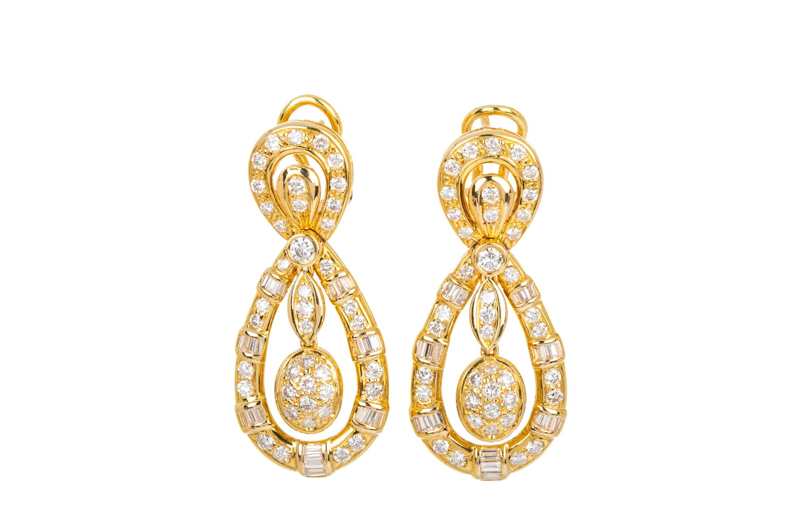 18K GOLD & 1.60cttw DIAMOND DROP EARRINGS 13.81g: 18K yellow gold articulated drop earrings measuring 36.3mm long by 15.9mm wide, equipped with fixed posts and omega backs. Featuring 82 round brilliant cut diamonds and 42baguette cut diamonds, rangin