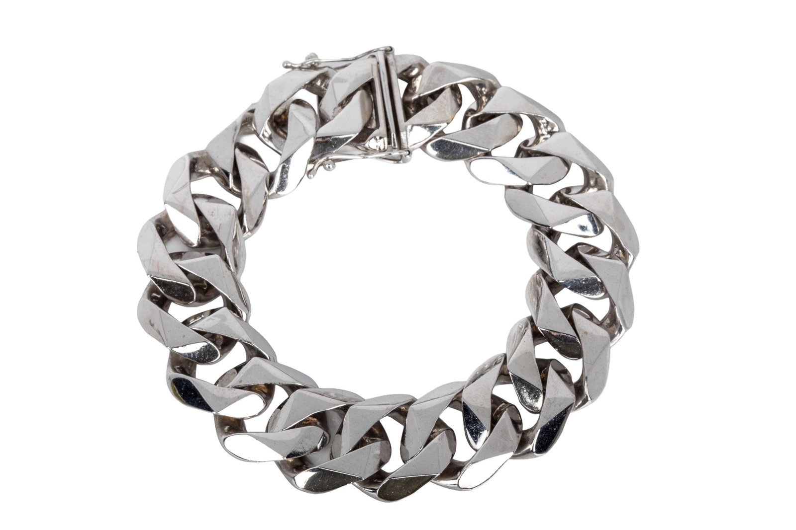 14K WHITE GOLD 9 INCH CURB LINK BRACELET 126.8g: 14K white gold rhodium plated curb link bracelet measuring 9 inches long by 19.6mm wide by 4.8mm thick. Equipped with heavy box catch and 2 side safetycatches. 126.8 grams Good condition, moderate scu