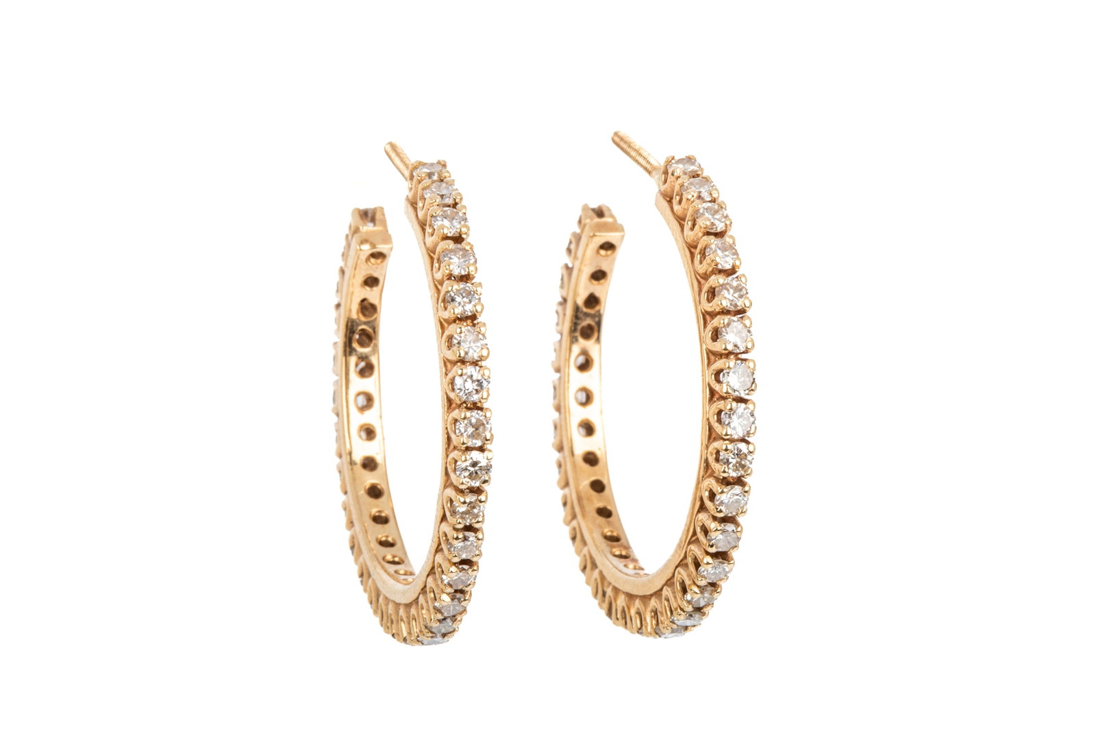 18K DIAMOND EARRINGS 2.40cttw 9.78g: Yellow gold diamond earrings testing approximately 18K, measuring 31.4mm long by 2.6mm wide, equipped with fixed threaded posts. Featuring 60 round brilliant cut diamonds of VS-HI quality. Estimated t