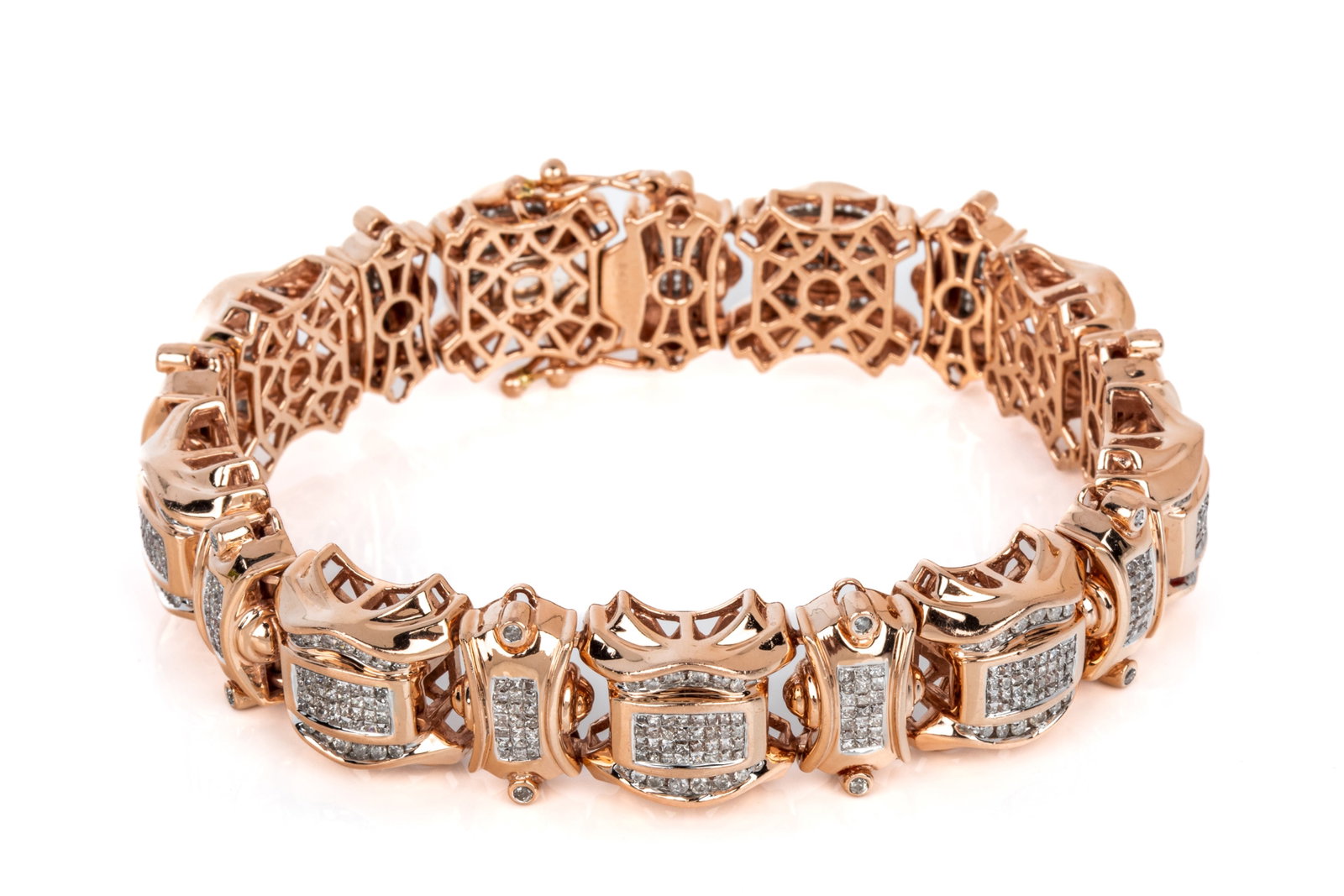 14K ROSE GOLD 12cttw DIAMOND GENTS BRACELET 165g: 14K rose gold diamond gents bracelet measuring 9.25 inches wearable length by 18.2mm wide by 9.6mm tall, equipped with hidden box catch with white gold tongue and black rhodium plated release button, 
