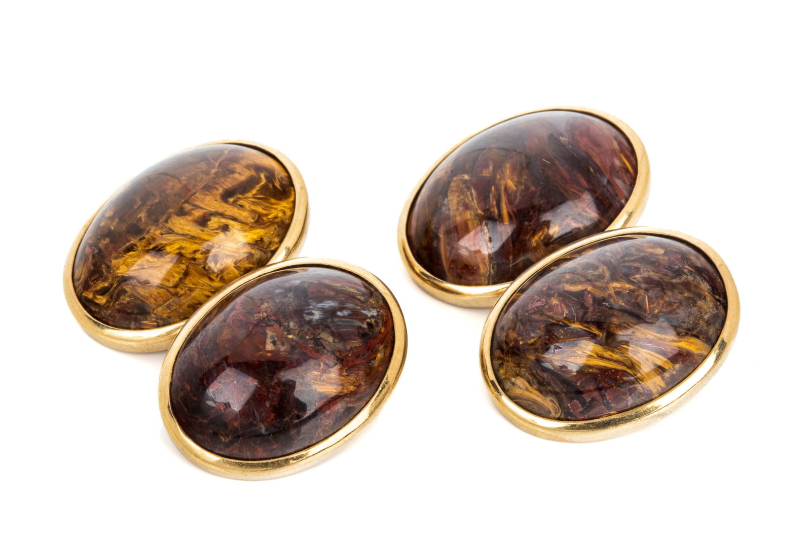 18K BURLED TIGER'S-EYE FRENCH CUFF CUFFLINKS 21g: Handmade yellow gold French cuff cufflinks testing approximately 18K, each measuring approximately 21 x 15.5 x 6.5mm. Featuring 4 oval cabochon cut natural burledtiger's-eye, displaying swirling layer