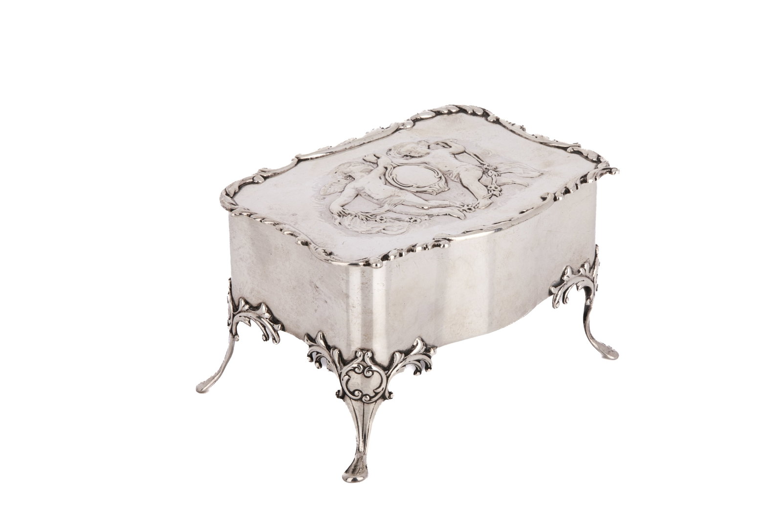 ANTIQUE ENGLISH SILVER FOOTED JEWELLERY BOX, 242g: Antique silver decorative box with a blue velvet lining. Weight 242gH. 3in x W. 5in x 3 1/4in (7.6cm x 12.7cm x 8.3cm)