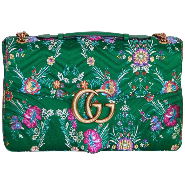 GUCCI FLORAL JACQUARD EMBROIDERED MARMONT BAG: Gucci Large GG Marmont Green Satin Floral Jacquard Embroidered Flap Bag with Gold-tone Hardware, 2015. Including care booklets and pink dust bag. Made in Italy. Serial number 466448 498879. 40 x 27 x 