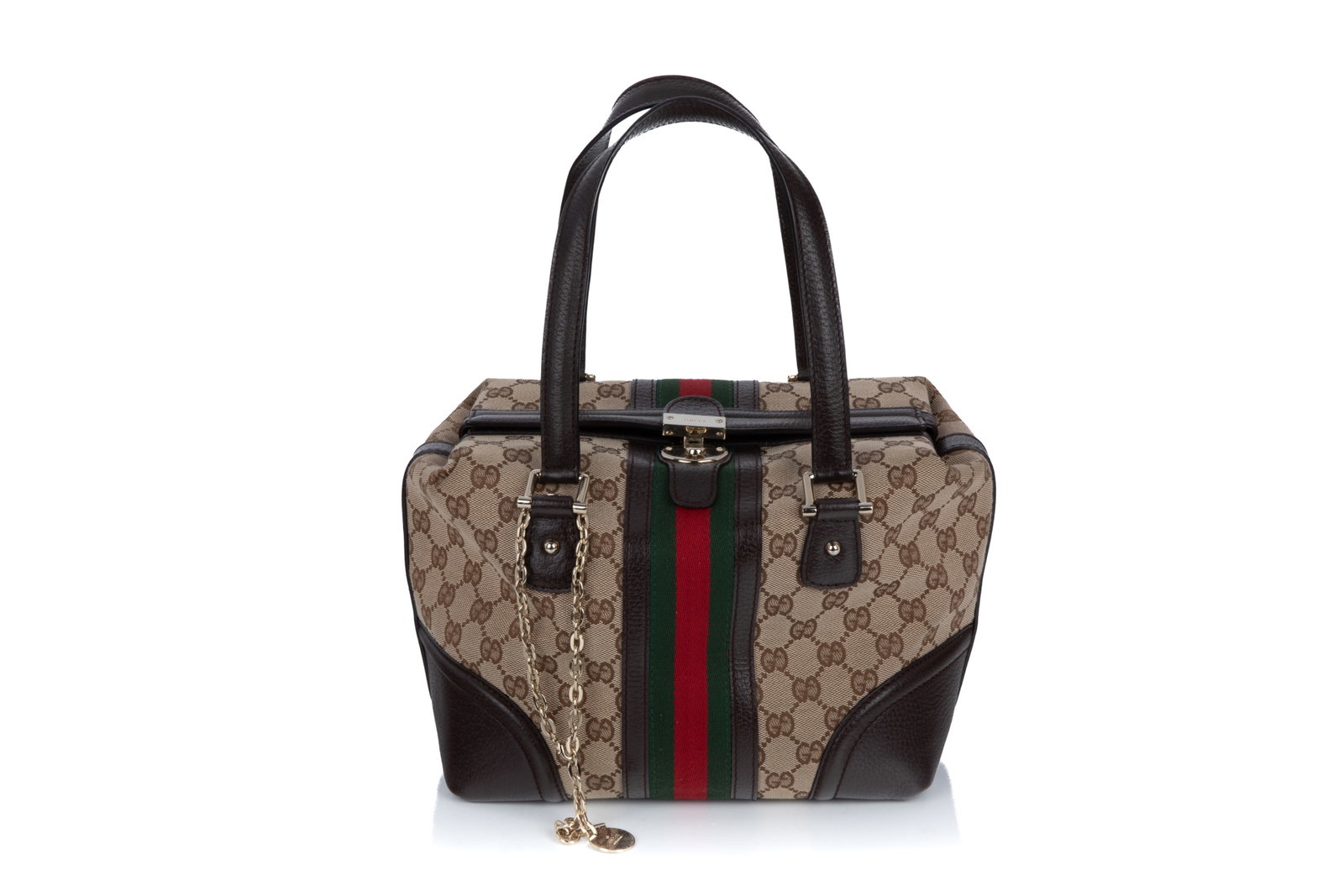 GUCCI GG MONOGRAM CANVAS TREASURE BOSTON BAG: Gucci GG Monogram Canvas Treasure Boston Bag. Including a dust bag and a key attached to the handle by a gold-toned chain. Made in Italy. Serial number 146002 213043. 25 x 14 x 19 cm