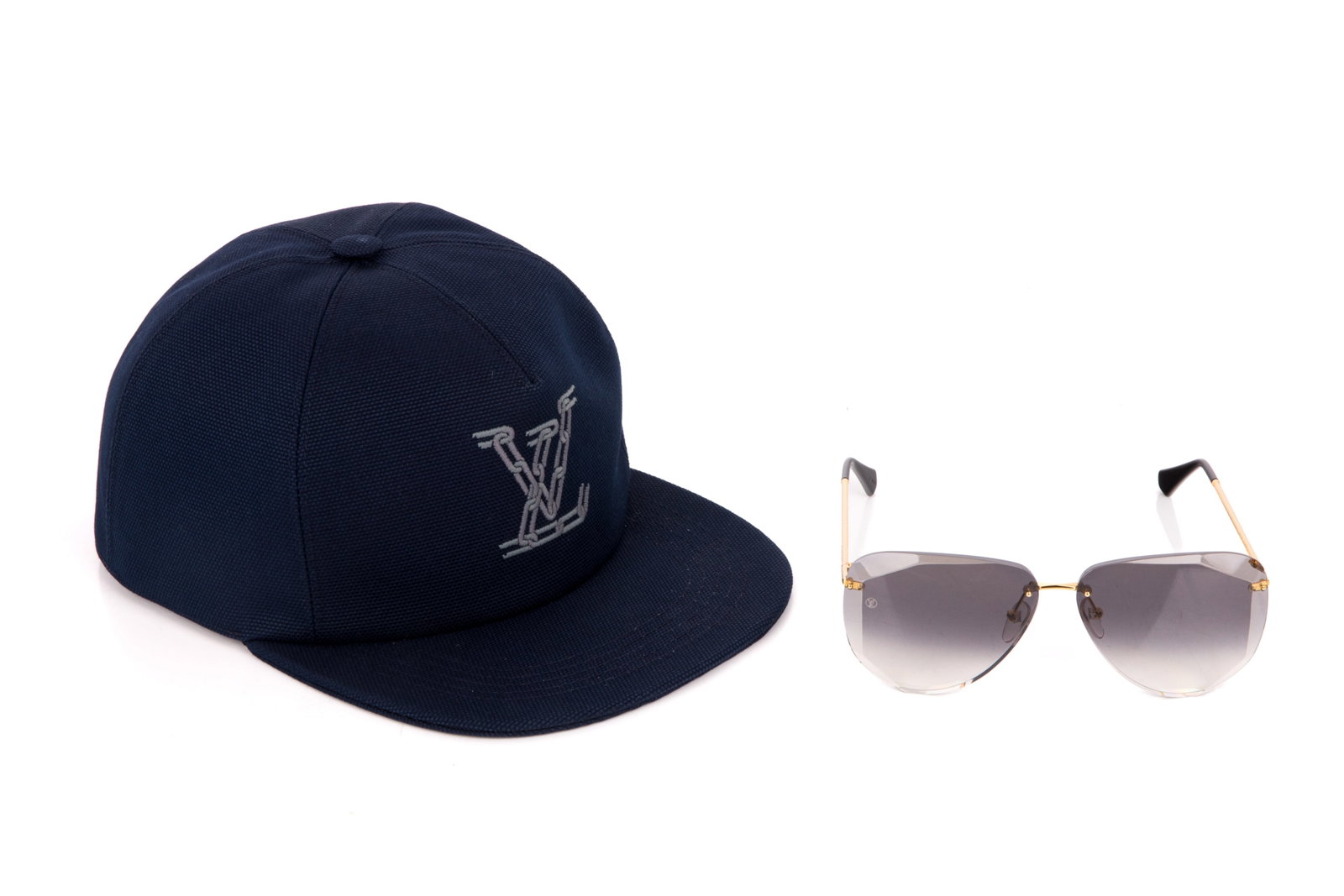 LOUIS VUITTON CHAIN CAP AND PILOT SUNGLASSES: Including a Louis Vuitton "LV Chain" Baseball Cap designed by Virgil Abloh in navy blue and size medium in mint condition (including original RFID tag, box, and gift receipt); and a pair of LouisVuitt