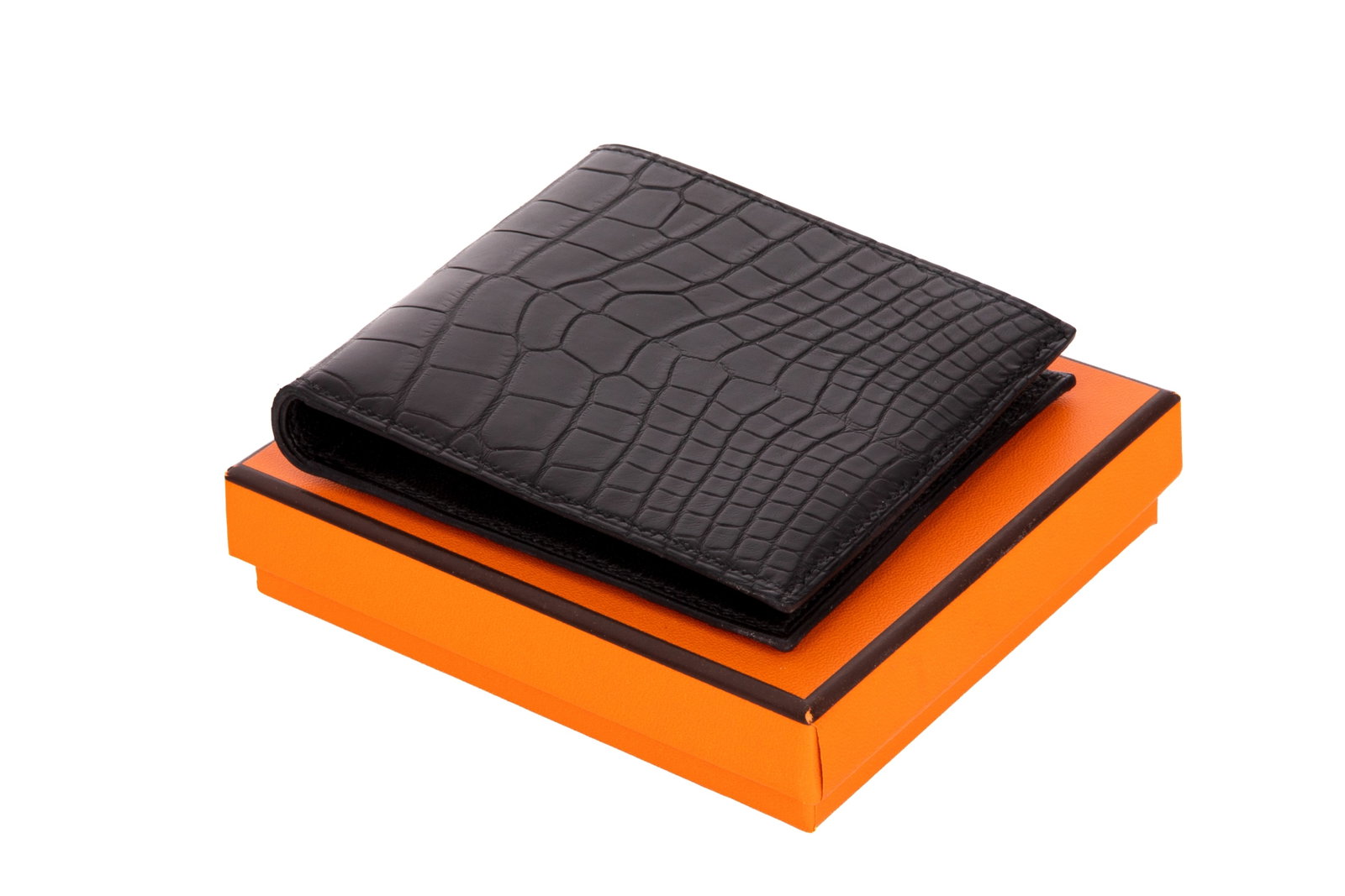 HERMES BLACK ALLIGATOR MEN'S COMPACT WALLET: Hermes Matte Black Alligator Mississippiensis MC2 Copernic Compact Wallet, 2018. With exotic leather square stamp engraved in silver. Made in France. In mint condition with original box. 11 x 9 cm