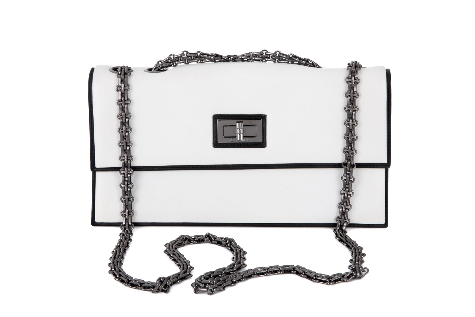 CHANEL WHITE AND BLACK CALFSKIN MADEMOISELLE FLAP: Chanel White and Black Calfskin Rectangular Mademoiselle Flap Bag Ruthenium Hardware, 2008-2009, made in France. Including original dust bag. Does not includingoriginal box, authenticity card, or care