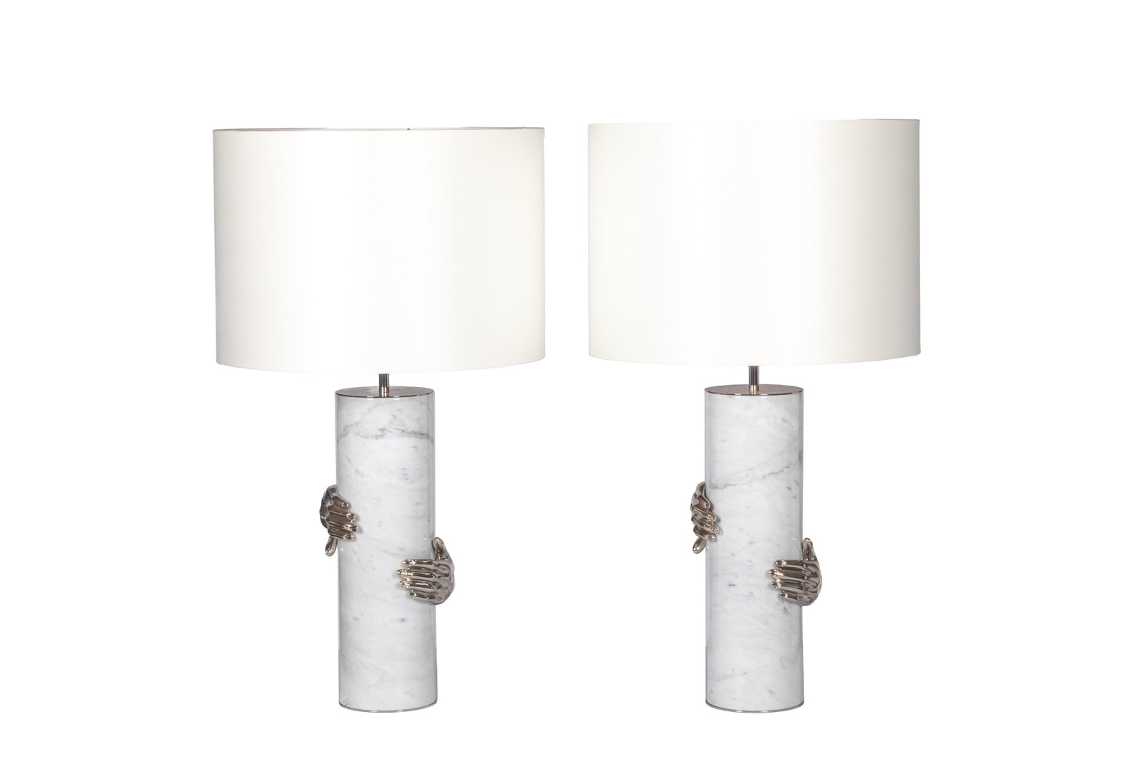 PAIR OF KOKET VENGEANCE MARBLE TABLE LAMPS: White marble column lamps with cast hands grasping the body of the lamp. H. (body) 19", Overall H. 35"