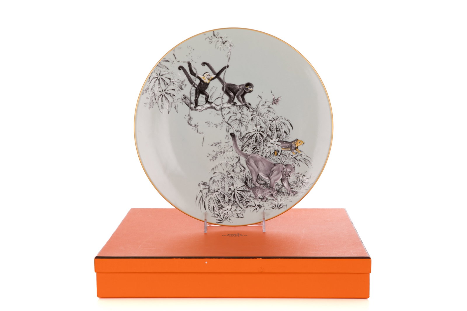 HERMES FRANCE PORCELAIN CHARGER PLATE: Hermes Carnets D'Equateur pattern with gilt rim designed by Robert Dallet. With original fitted box, French, 21st century.Diam. 32cm (12 1/2in)
