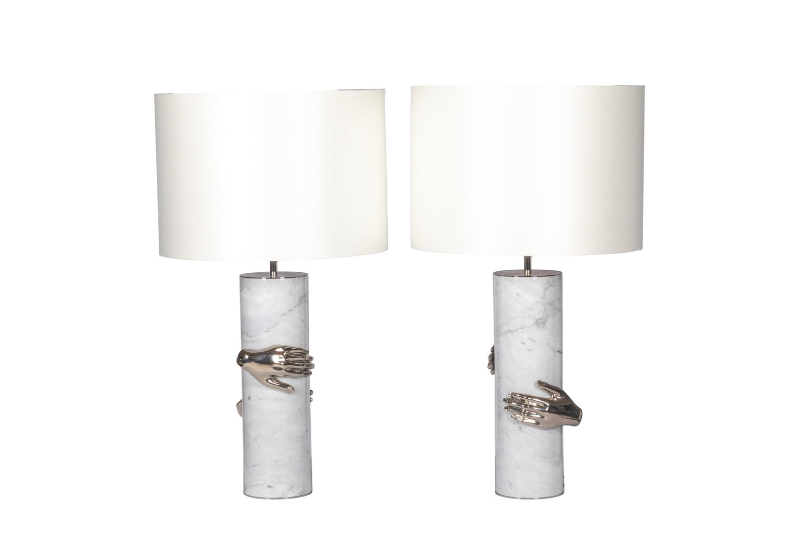 PAIR OF KOKET VENGEANCE MARBLE TABLE LAMPS: White marble column lamps with cast hands grasping the body of the lamp. H. (body) 19", Overall H. 35"