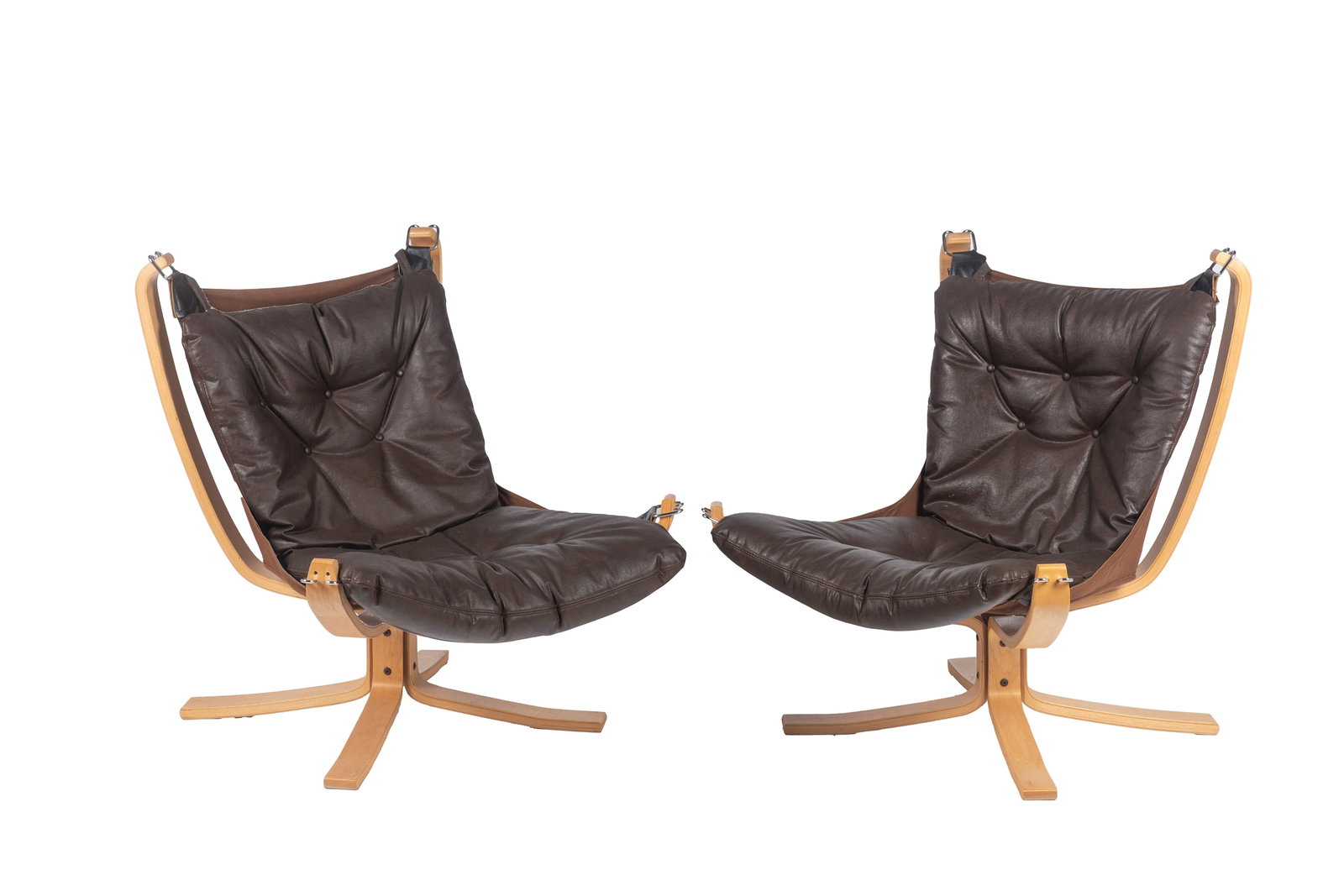 PAIR OF VINTAGE BROWN LEATHER FALCON CHAIRS: Designed by Sigurd Ressel, with bentwood frames. Norwegian, circa 1970. H. 33in x W. 30in x D. 28 1/2in