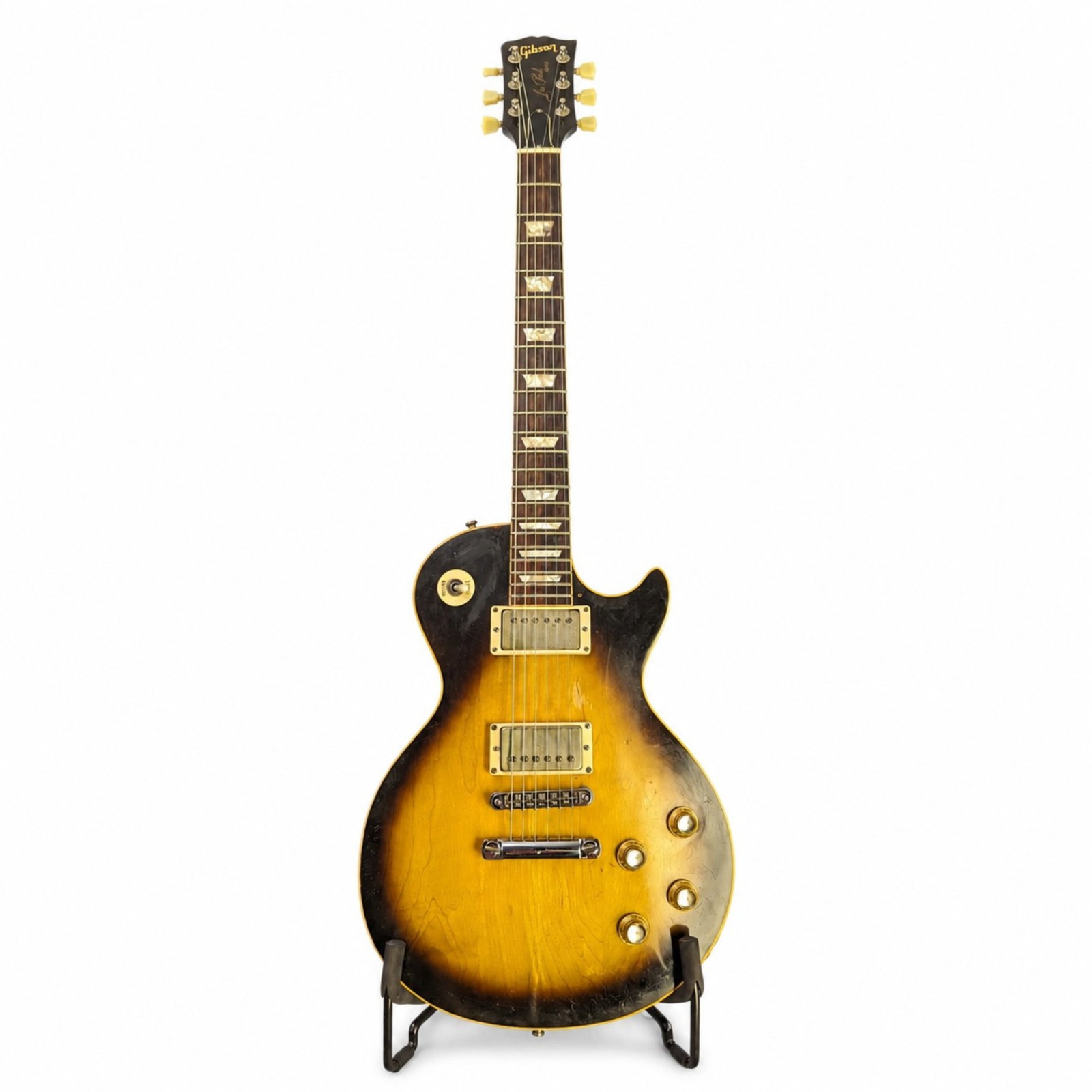 MYLES GOODWYN'S GIBSON LES PAUL GUITAR: Serial number 3139. Made in 1975. Tobacco Sunburst finish. Myles Goodwyn used this guitar extensively live in his later years, and it was used during his final touring concert with April Wine on March