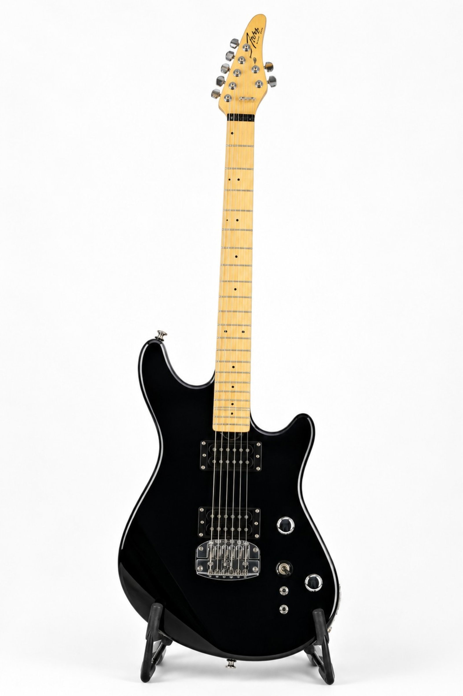 MYLES GOODWYN'S FURY BARITONE GUITAR: Serial number 21286. Black finish. Fury Guitars are Canada's original electric guitar manufacturer, based in Saskatoon, SK. Fury Guitars represents a significant segment of MylesGoodwyn's collection, 