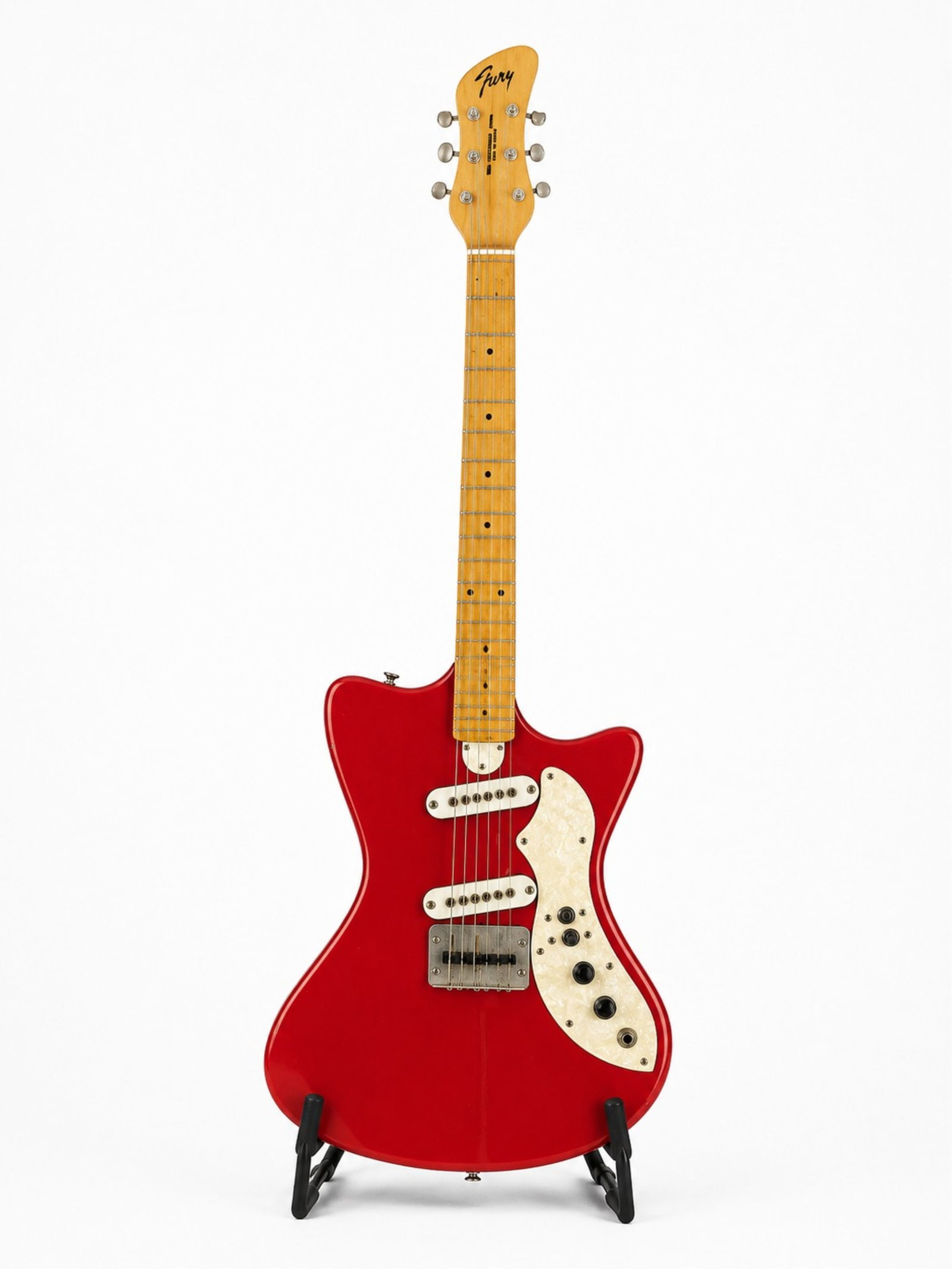 MYLES GOODWYN'S FURY SEMI PRO MODEL GUITAR: Serial number 70008. Made ca. 1962. Red finish. Very early example of Fury Guitars. Fury Guitars are Canada's original electric guitar manufacturer, based in Saskatoon, SK. FuryGuitars represents a si