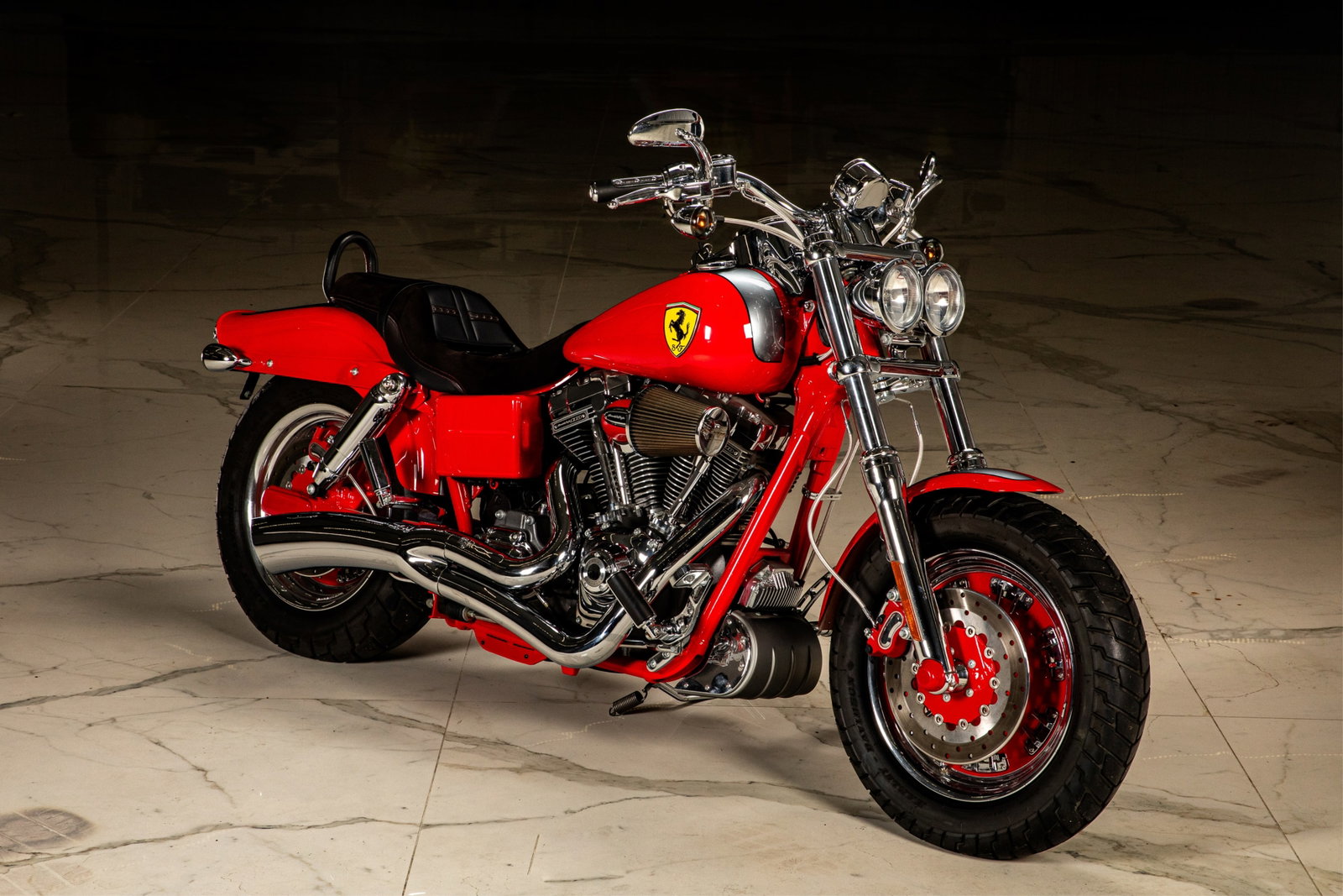 CUSTOMIZED HARLEY DAVIDSON SCREAMIN EAGLE 110: With Ferrari red and badge paint VIN: 1HD1PX8159K977009 Year: 2009 Make: HARLEY-DAVIDSONModel: Fat Bob Series: FXDFSE Vehicle Type: MOTORCYCLE Body Class: Motorcycle - Custom Manufacturer: