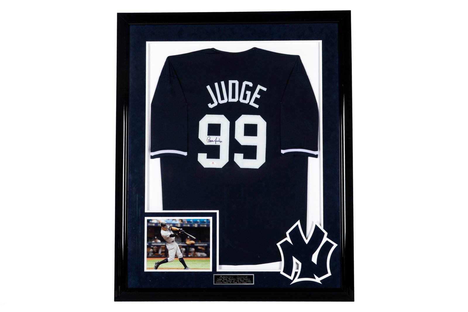 AARON JUDGE SIGNED NEW YORK YANKEES JERSEY: Aaron Judge signed #99 New York Yankees jersey. Comes with a Certificate of Authenticity from Modern Memorabilia # 15715. Framed measurements: H. 43 1/2" x W. 35 1/2"