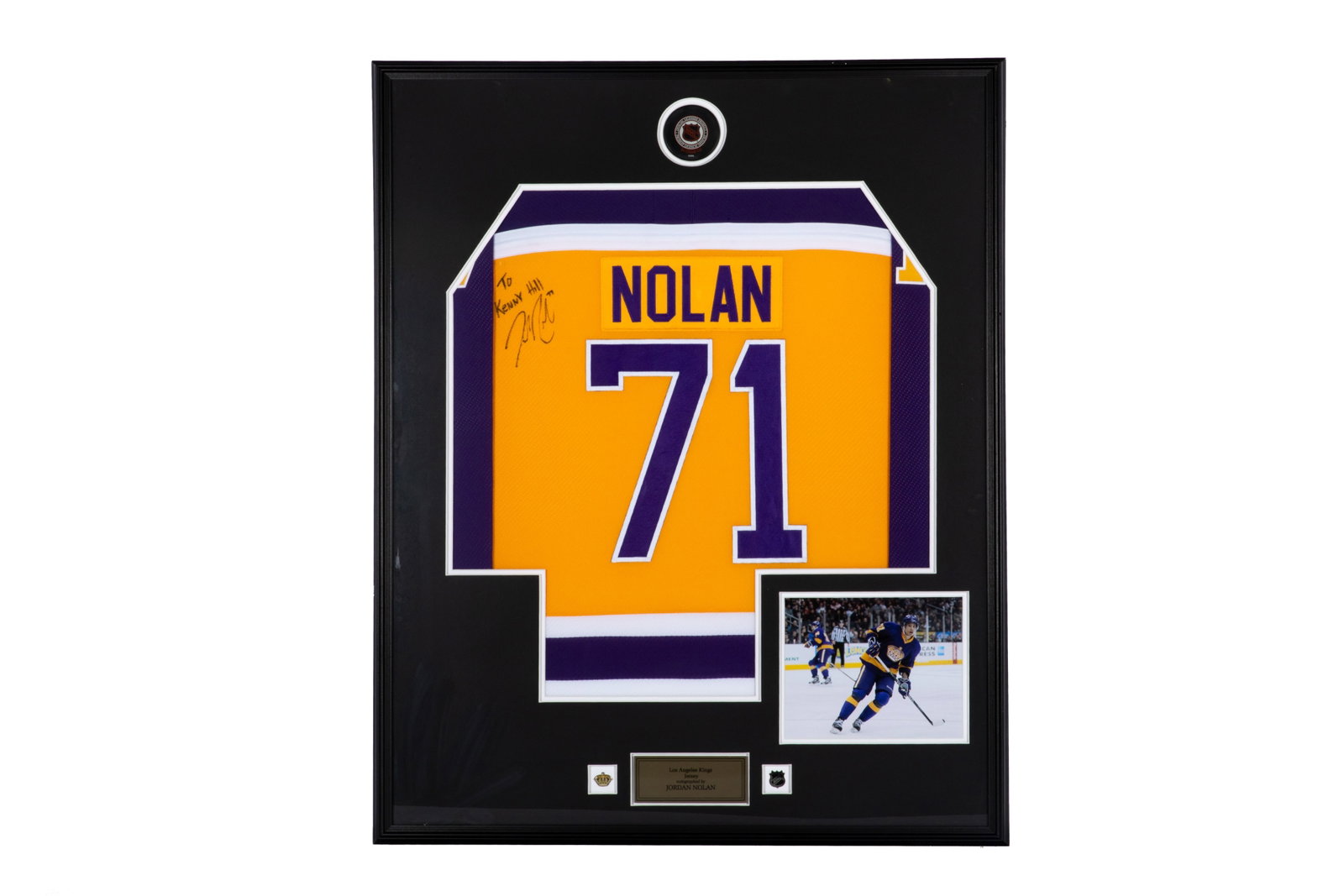 JORDAN NOLAN LOS ANGELES KINGS SIGNED JERSEY: Jordan Nolan inscribed #71 Los Angeles King jersey: "To / Kenny Hill / Jordan Nolan 71". H. 42 1/2" x W. 34 1/2" This lot does not come with a Certificate orLetter of Authenticity.