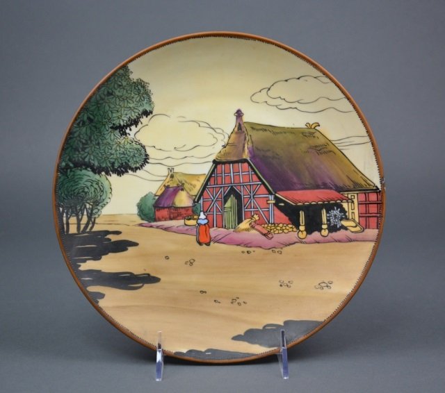 Nippon Porcelain Plaque: - Of a village scene with beaded brown border. Green M-in-Wreath. Dia 25.5 cm. (10 in.)