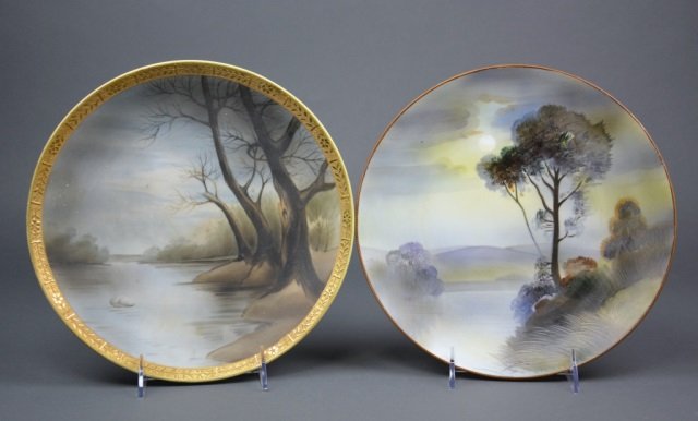Two Nippon Porcelain Plaques: - Each of a night landscape. Gilt border to one. Green M-in-Wreath. Dia 26 cm. (10 1/4 in.)