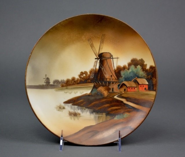 Nippon Porcelain Plaque: - Hand painted with Dutch landscape and windmill. Green M-in-Wreath. Dia 22 cm. (8 3/4 in.)