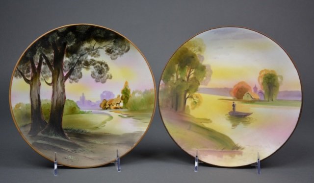 Two Nippon Porcelain Plaques: - Each hand painted with summer landscapes. Green M-in-Wreath. Dia 22.5 cm. (8 7/8 in.)