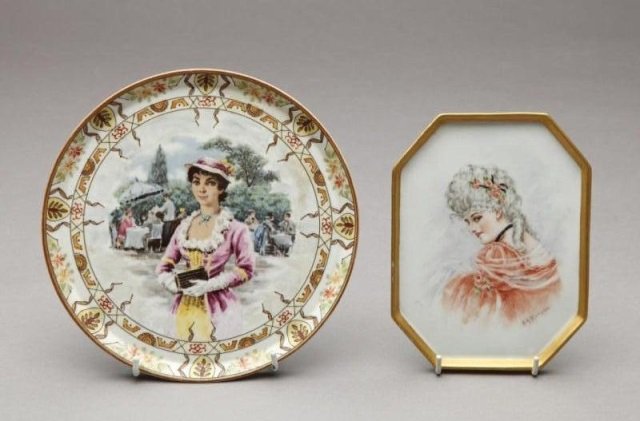 Two Noritake portrait trays: The first with a transfer printed French lady and Moriage border, the second with a hand painted lady signed H.H. Morson. Ray of Sun and Transitional marks, Dia 22.5 cm. (8 5/8 in.)