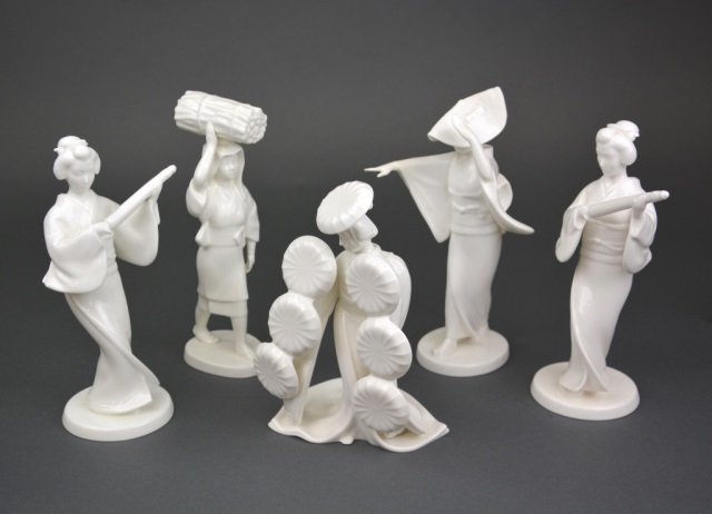 Five Noritake Blanc de Chine Figures: Each depicting a woman in kimono. H 22 cm. (8 3/4 in.) and smaller.