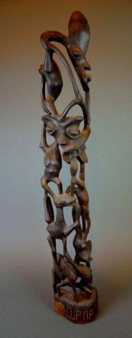 African ebony carving: - carved ebony figural group, Makonde (Tanzania). H: 39 in. (99 cm.)