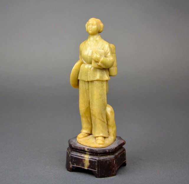 Carved Qingtian soapstone figure: - Carved as a young Cultural Revolution female barefoot doctor on a soapstone stand. Overall H: 20cm (7 7/8 in.)