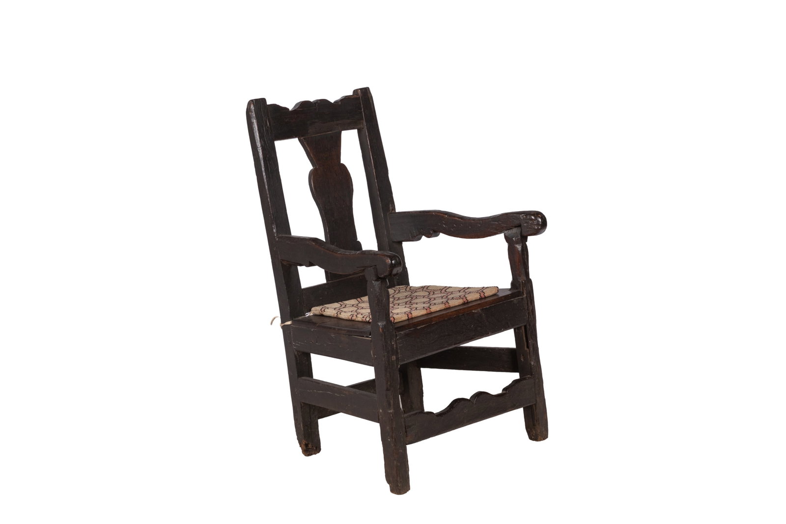 ENGLISH EARLY 18th C. OAK ARMCHAIR: Oak open armchair with Queen Anne style back splat, shaped crest rail and front stretcher. Northern England or Wales, ca: 1710-1730.H. 38in x W. 25in x D. 22 1/2in